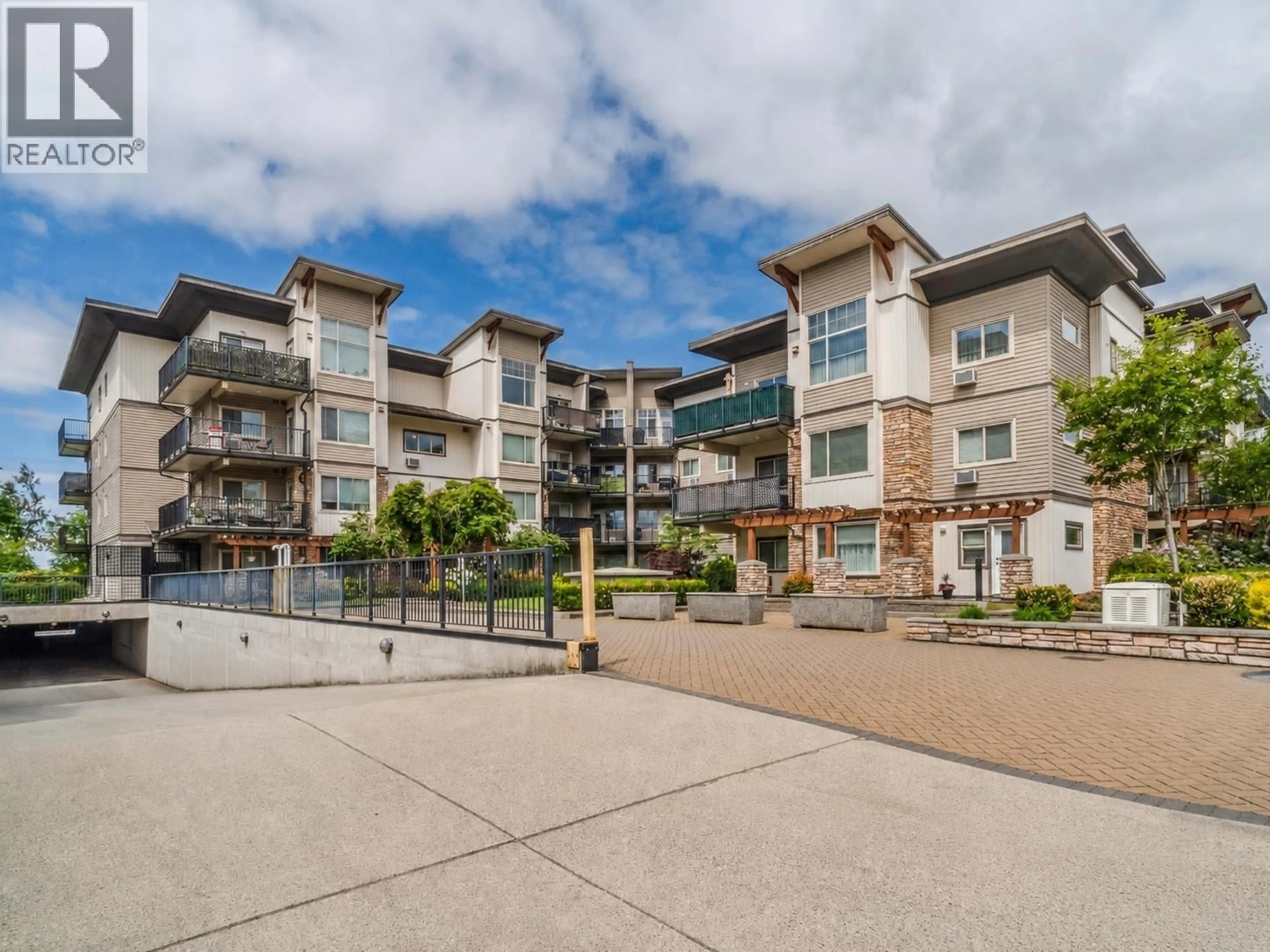A pic from outside/outdoor area/front of a property/back of a property/a pic from drone, water/lake/river/ocean view for 315 - 11935 BURNETT STREET, Maple Ridge British Columbia V2X9A9