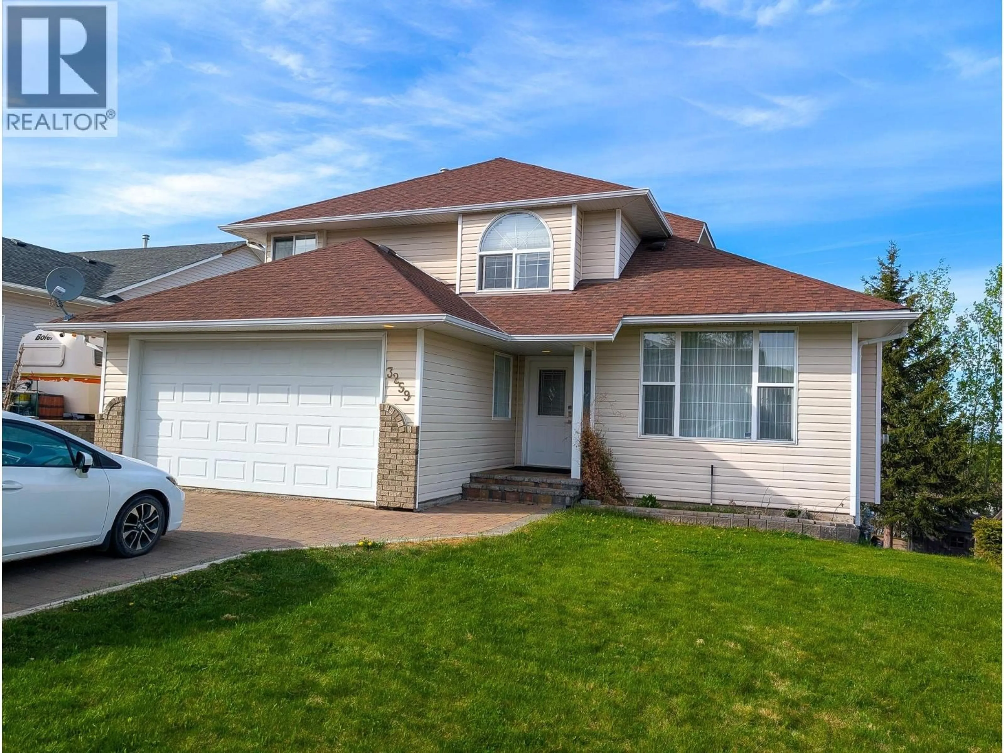 Home with vinyl exterior material, street for 3259 VISTA VIEW ROAD, Prince George British Columbia V2N6R7