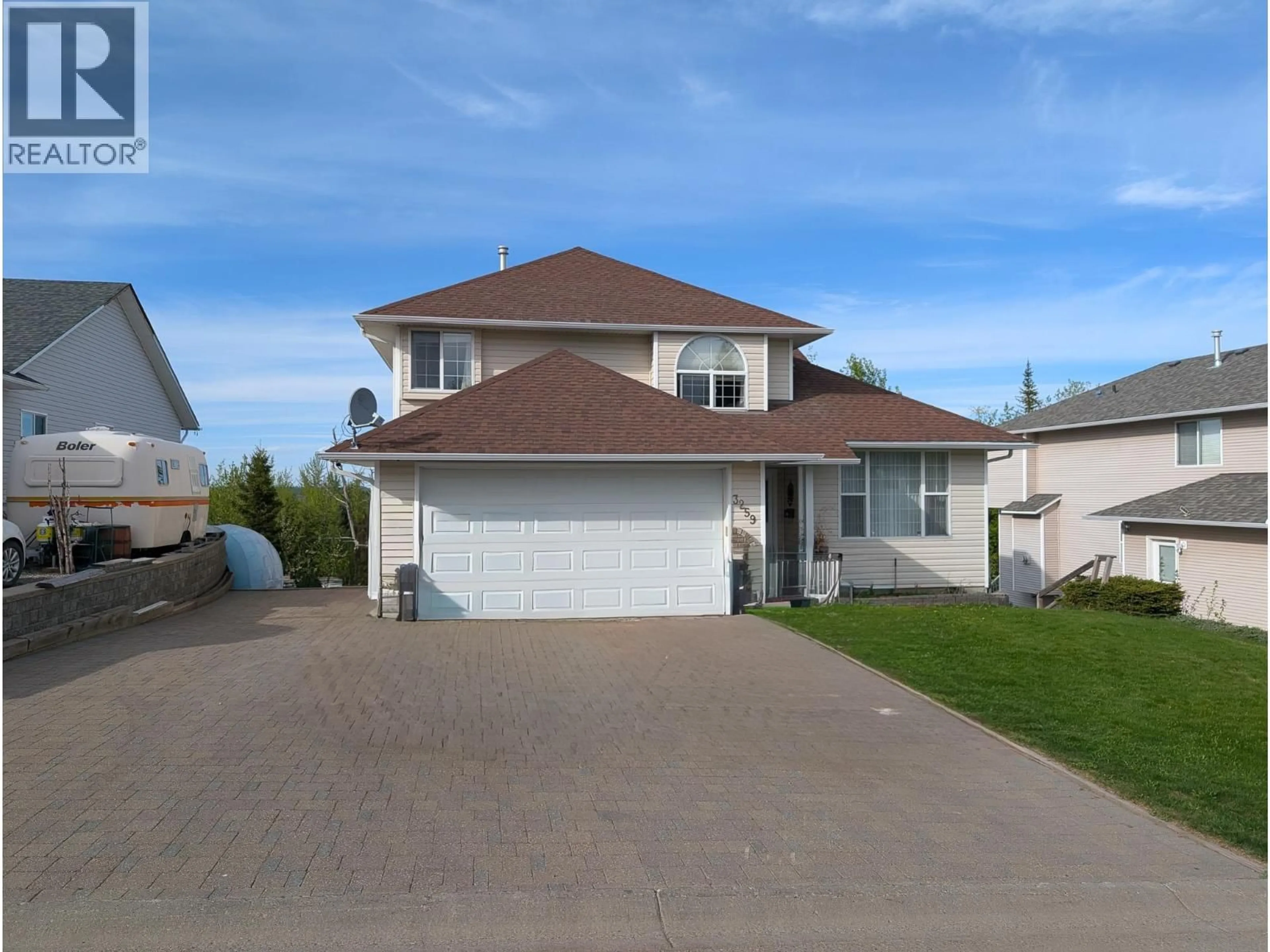 Home with vinyl exterior material, street for 3259 VISTA VIEW ROAD, Prince George British Columbia V2N6R7