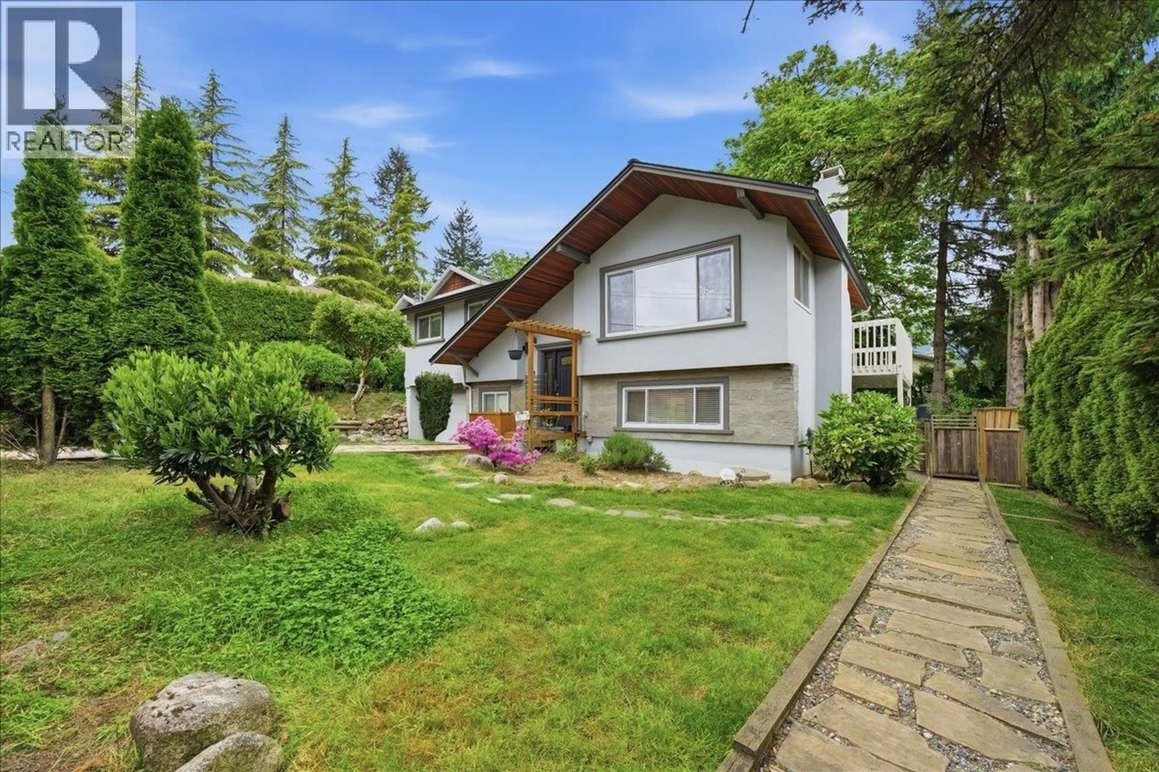 Home with vinyl exterior material, street for 4158 MT SEYMOUR PARKWAY, North Vancouver British Columbia V7G1C5