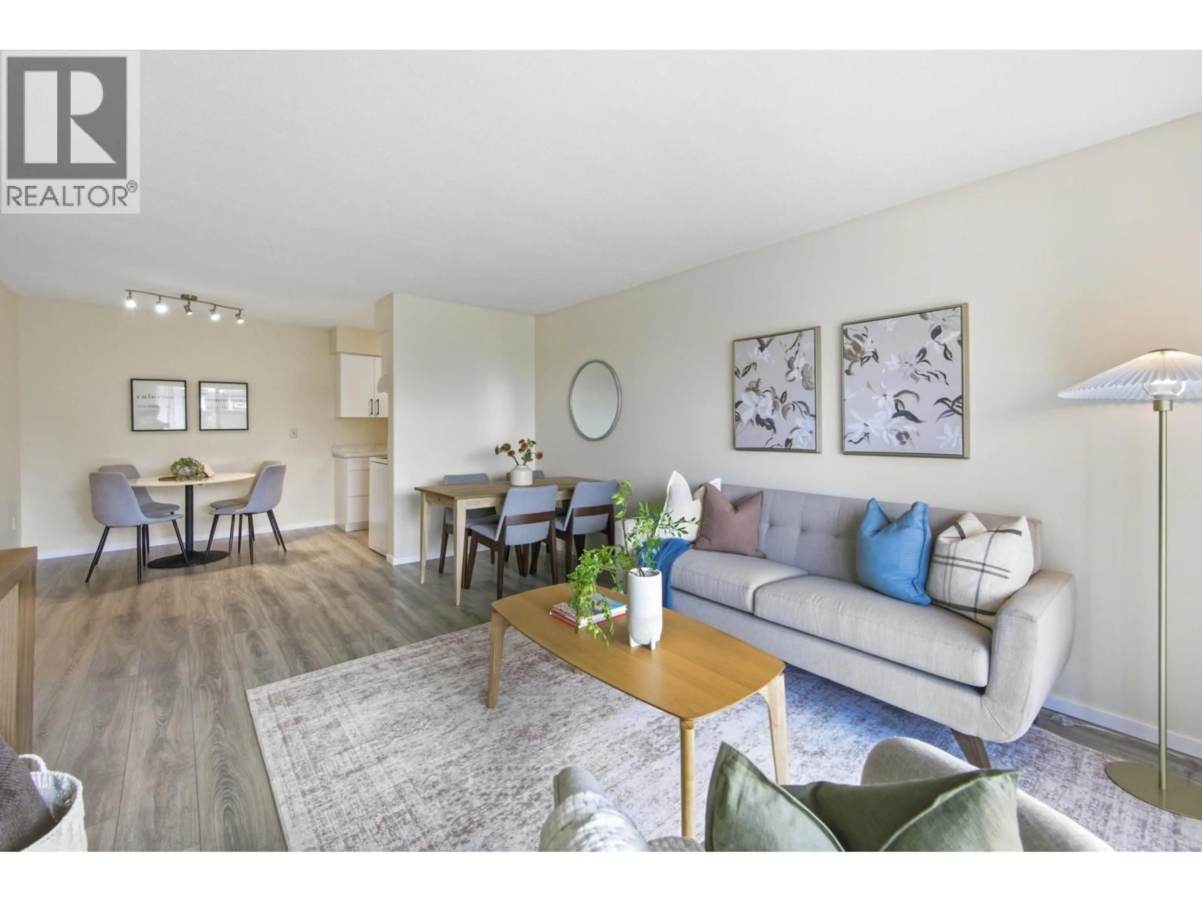 Living room with furniture, wood/laminate floor for 108 - 230 MOWAT STREET, New Westminster British Columbia V3M4B2