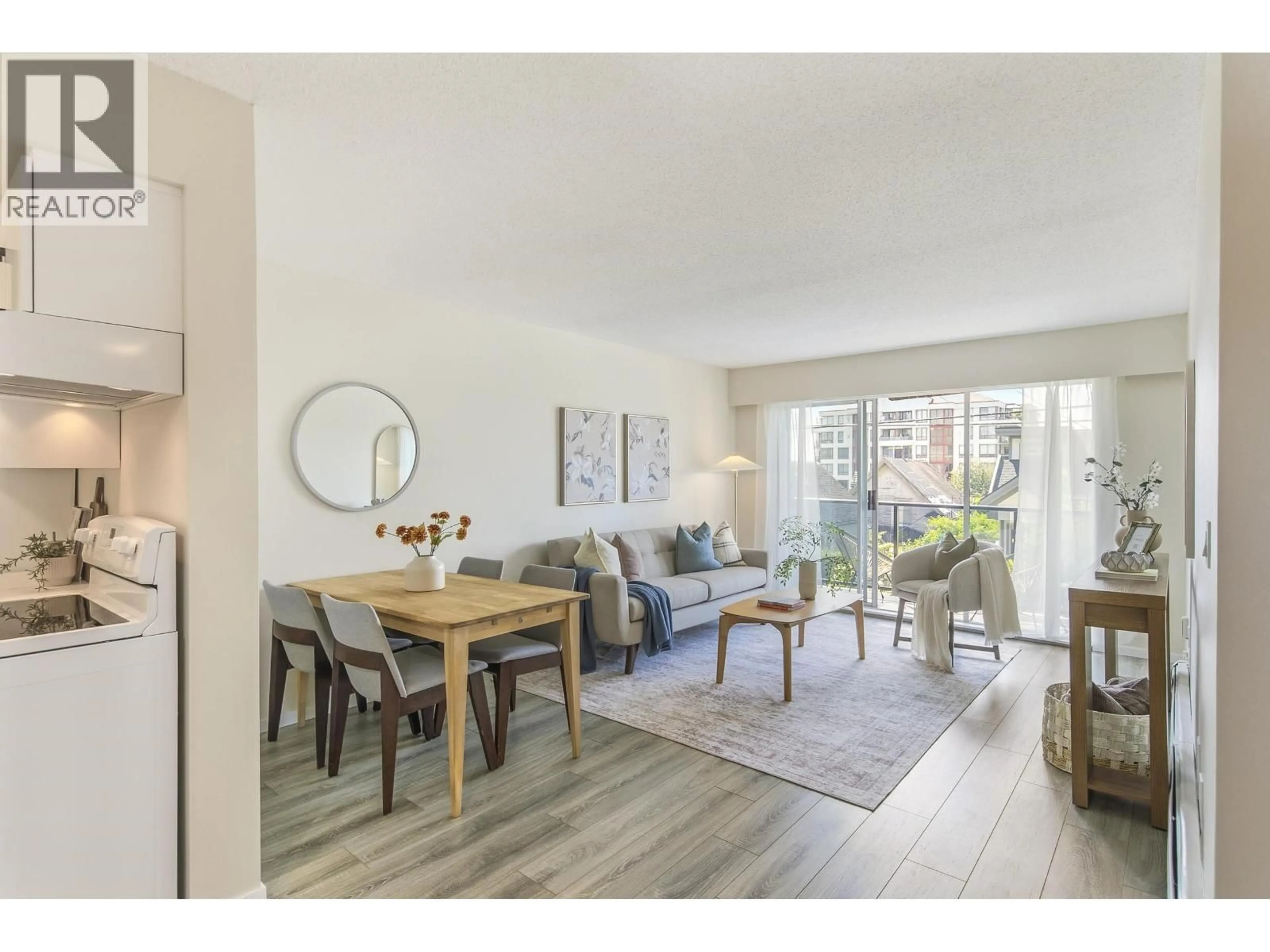 Living room with furniture, wood/laminate floor for 108 - 230 MOWAT STREET, New Westminster British Columbia V3M4B2