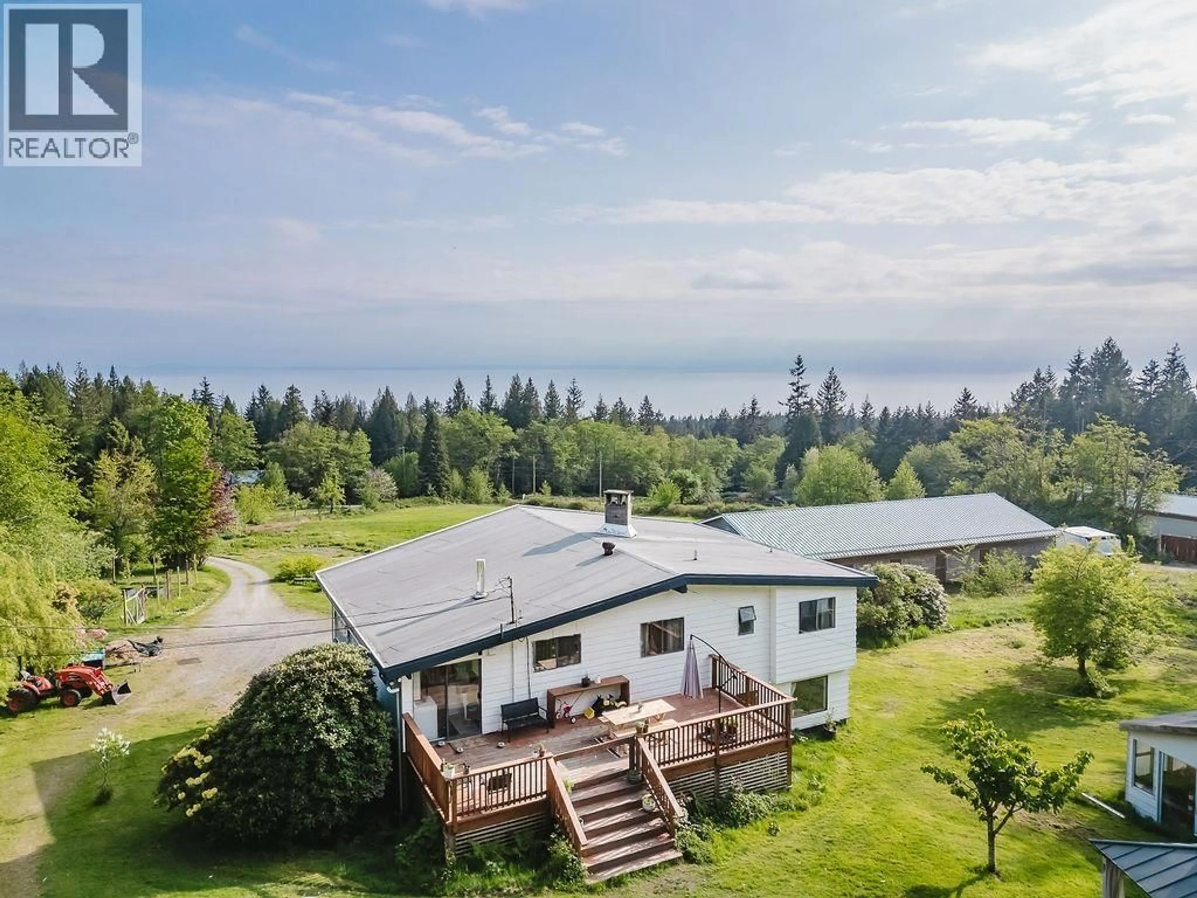 A pic from outside/outdoor area/front of a property/back of a property/a pic from drone, water/lake/river/ocean view for 1972 RANCH ROAD, Roberts Creek British Columbia V0N2W5