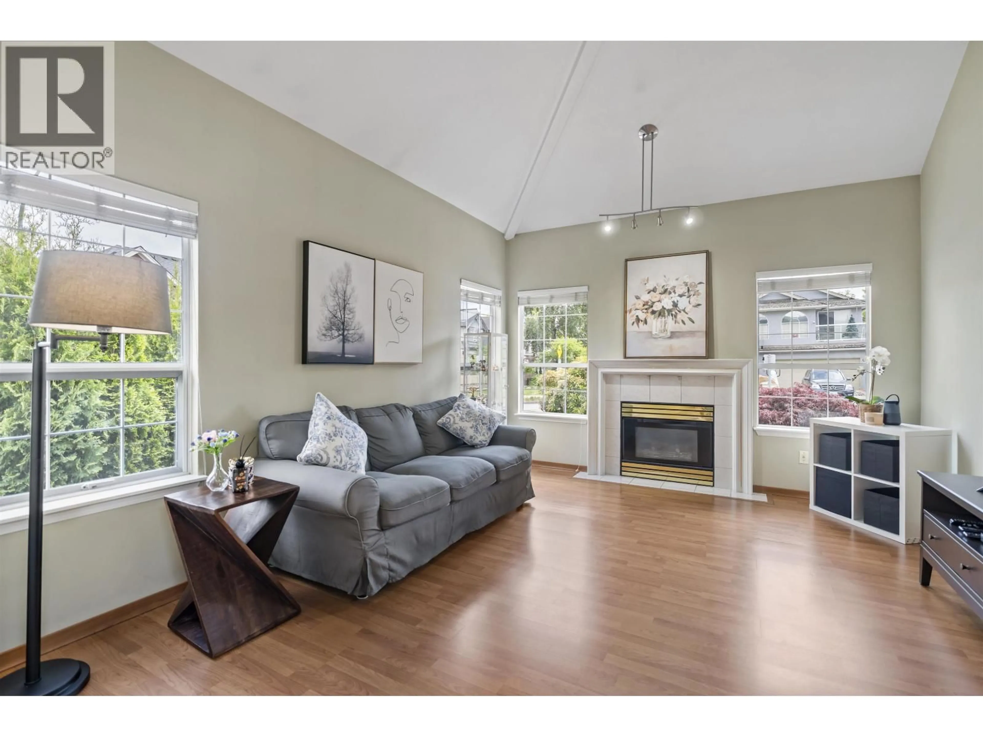 Living room with furniture, wood/laminate floor for 5111 TURNER STREET, Richmond British Columbia V6V2P8
