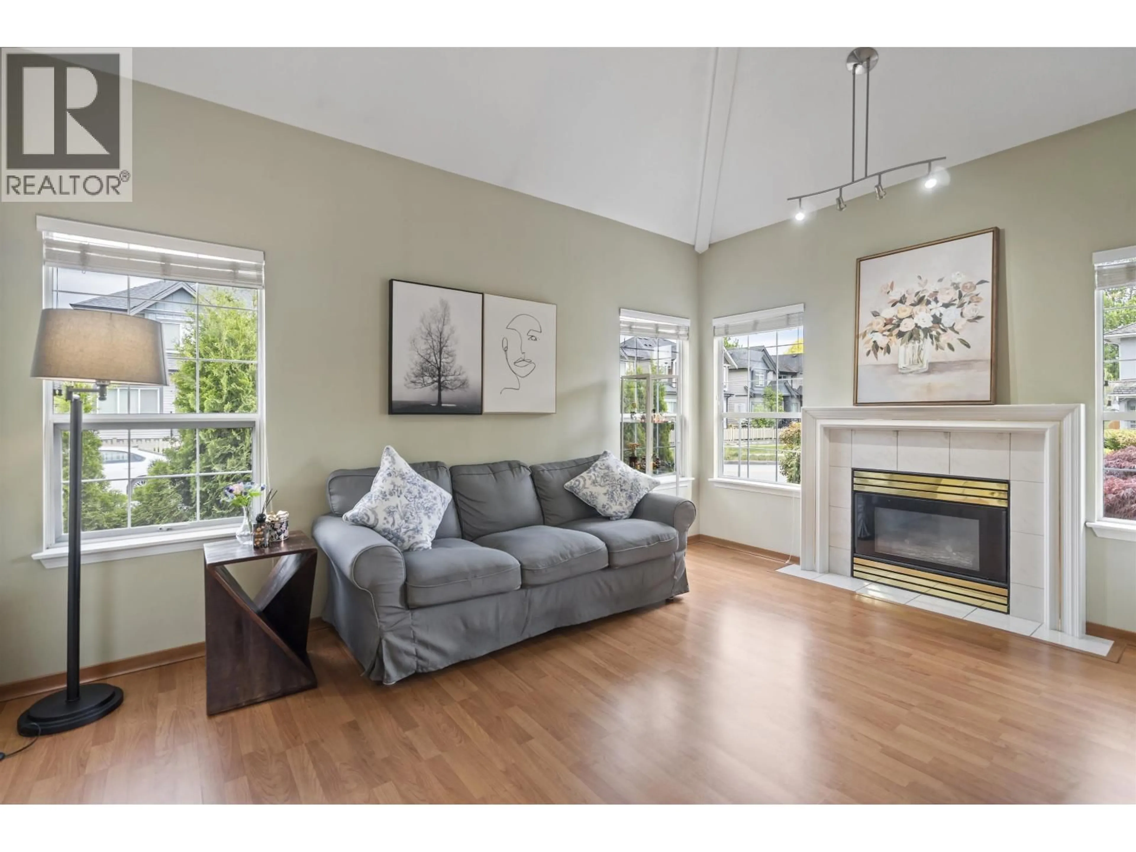 Living room with furniture, wood/laminate floor for 5111 TURNER STREET, Richmond British Columbia V6V2P8
