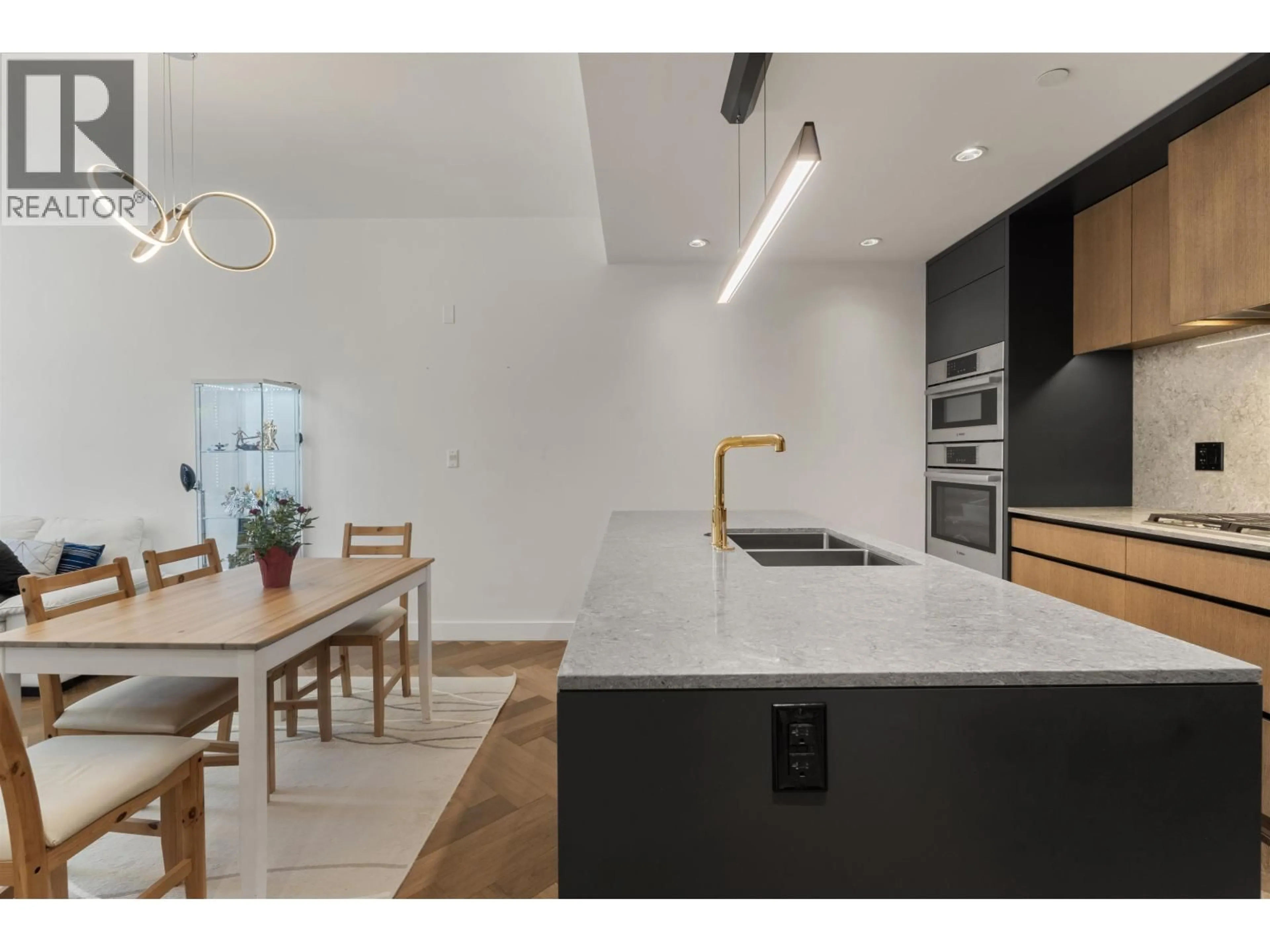 Open concept kitchen, unknown for 107 - 458 63RD AVENUE, Vancouver British Columbia V5X2J4