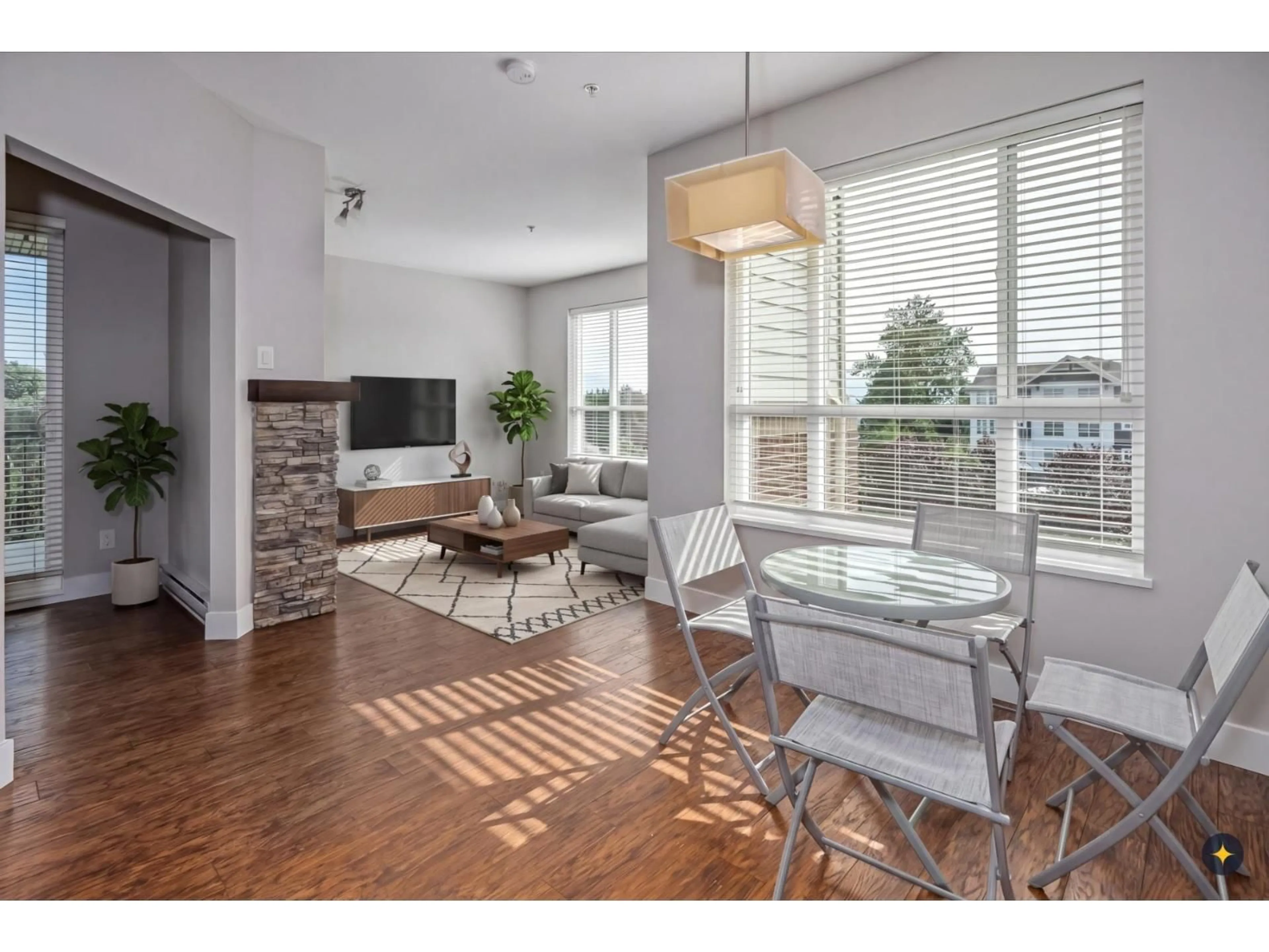 Living room with furniture, wood/laminate floor for 303 - 3192 GLADWIN ROAD, Abbotsford British Columbia V2T6M9