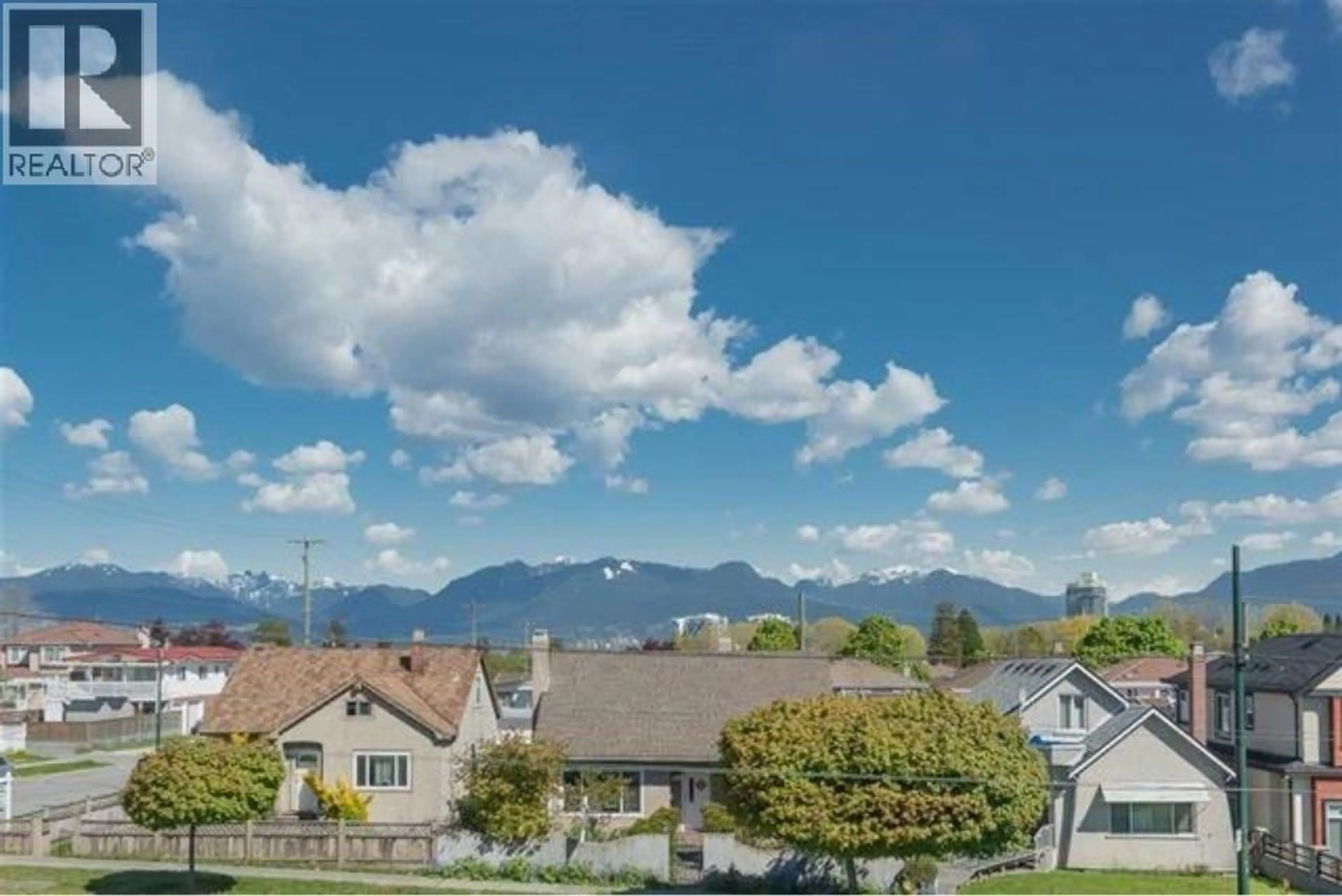 A pic from outside/outdoor area/front of a property/back of a property/a pic from drone, mountain view for 2208 41ST AVENUE, Vancouver British Columbia V5P1L6