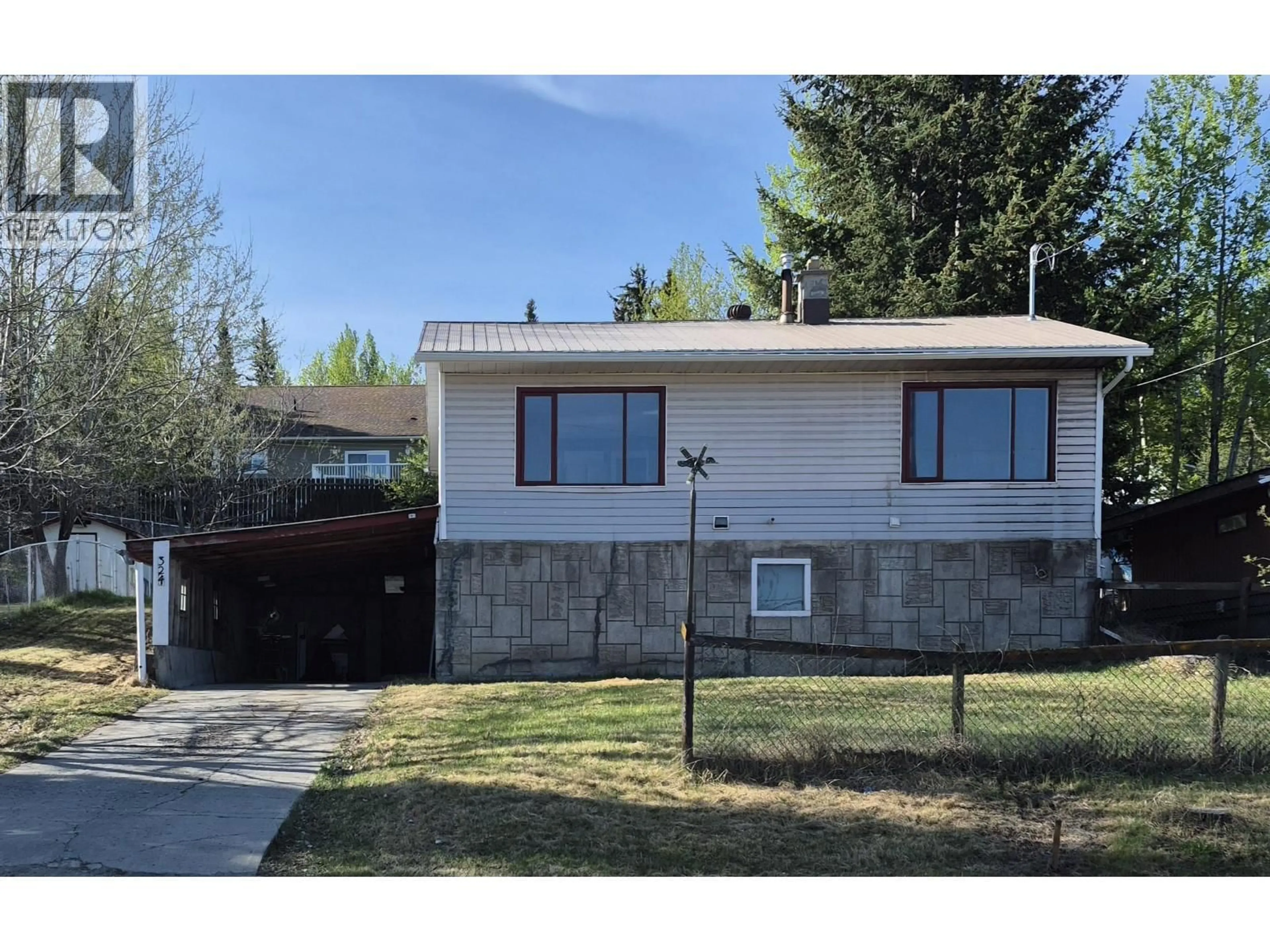 Home with vinyl exterior material, street for 324 5TH STREET, Vanderhoof British Columbia V0J3A0