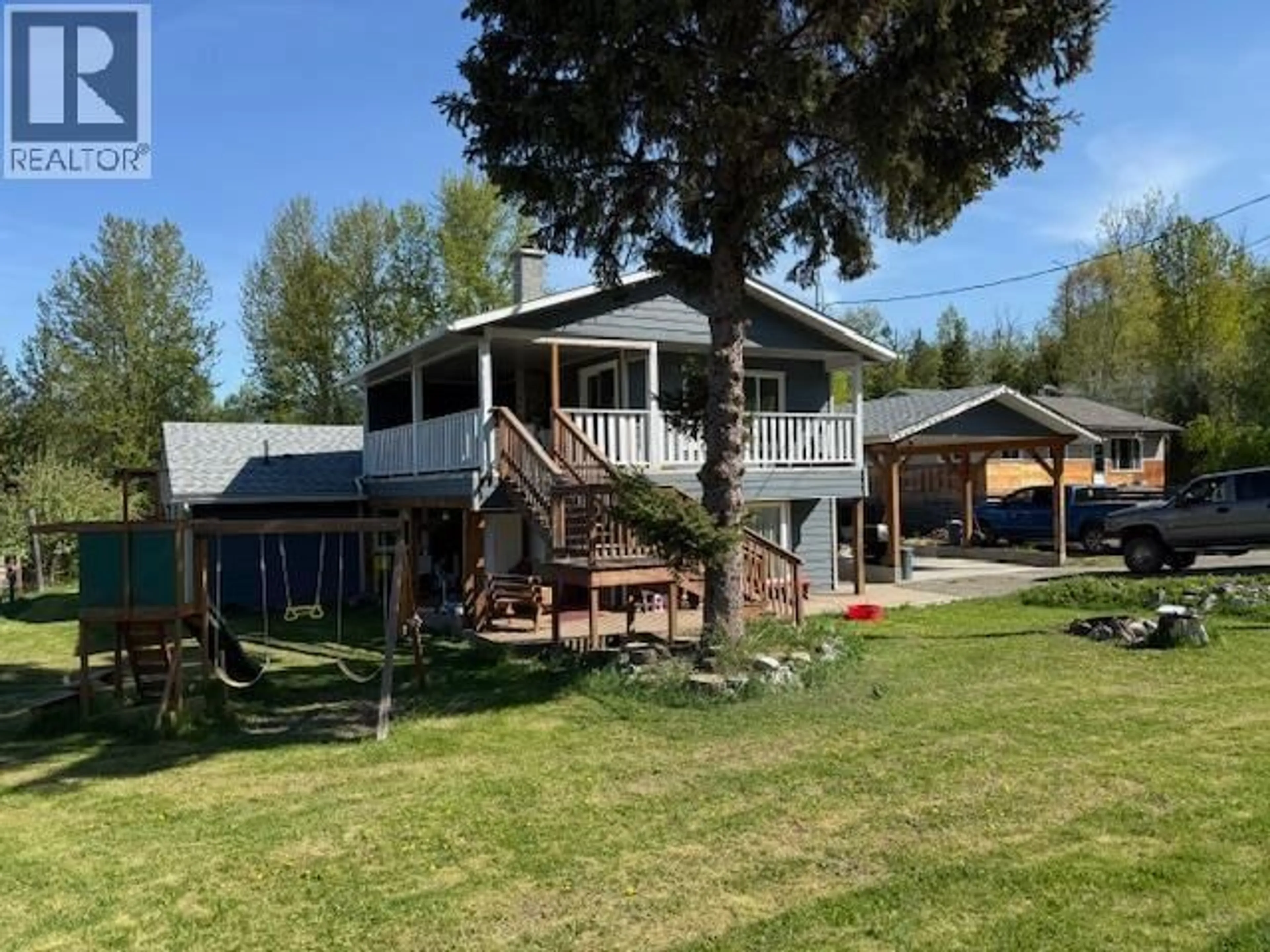 A pic from outside/outdoor area/front of a property/back of a property/a pic from drone, mountain view for 4939 13TH AVENUE, New Hazelton British Columbia V0J2J0