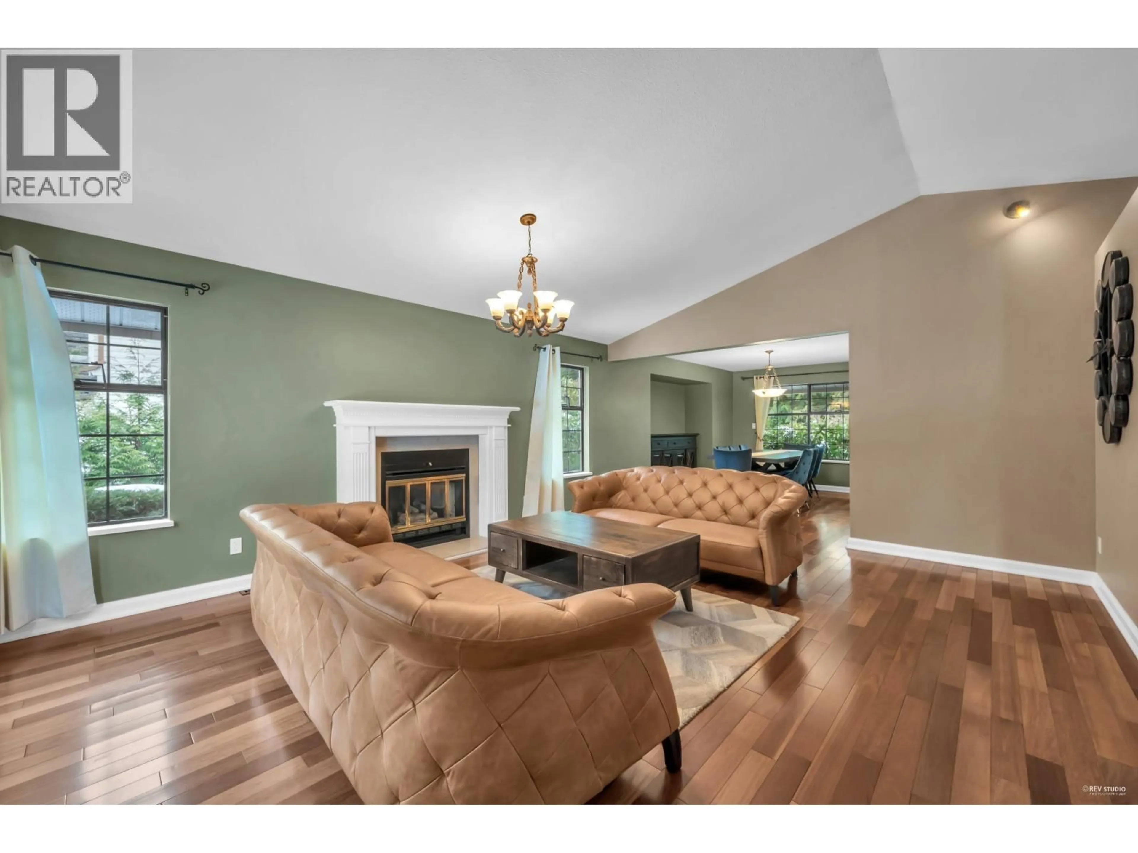Living room with furniture, wood/laminate floor for 7960 WESTLAKE STREET, Burnaby British Columbia V5A4J9