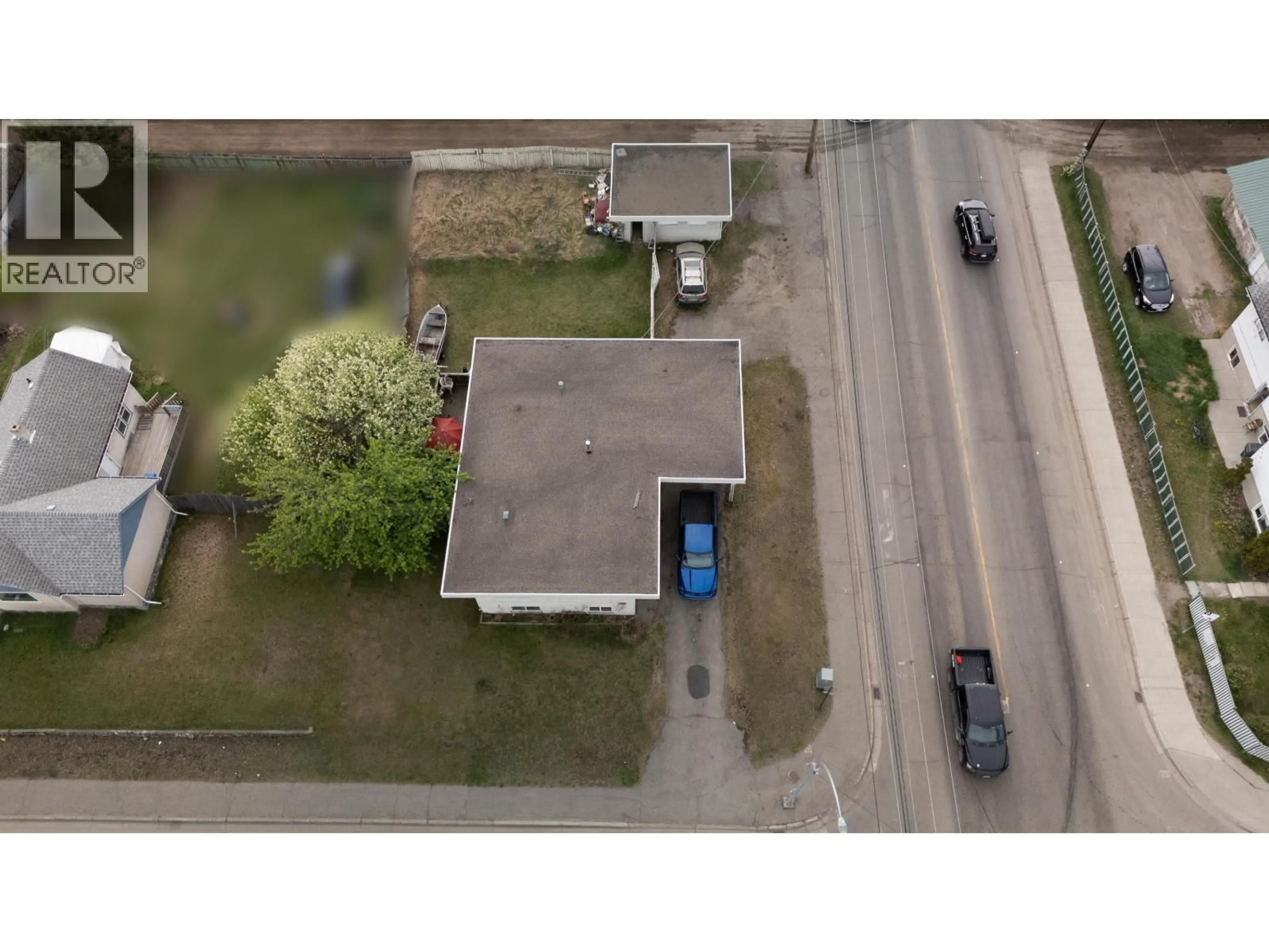 A pic from outside/outdoor area/front of a property/back of a property/a pic from drone, street for 1027 CARNEY STREET, Prince George British Columbia V2M2L1