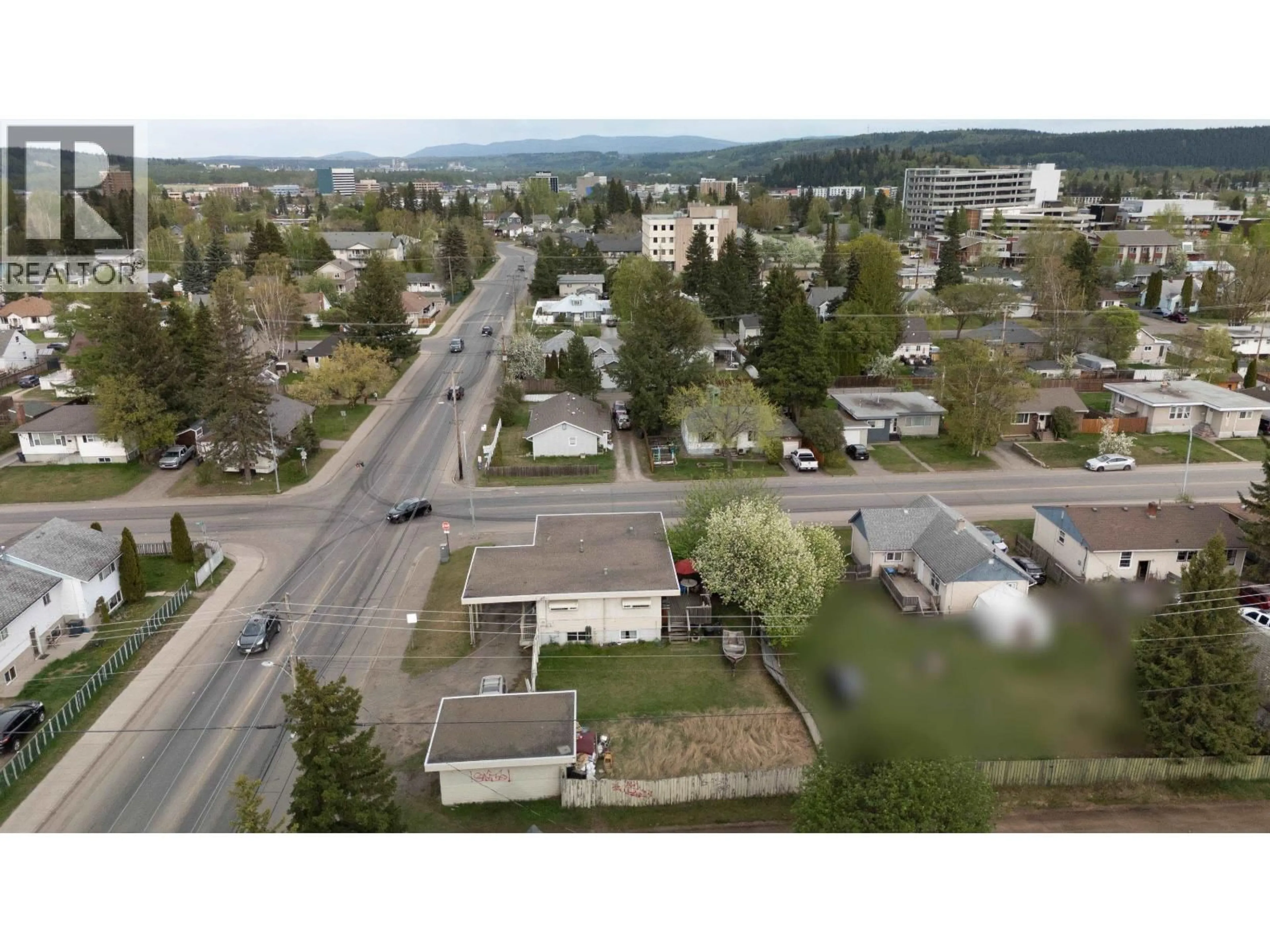 A pic from outside/outdoor area/front of a property/back of a property/a pic from drone, mountain view for 1027 CARNEY STREET, Prince George British Columbia V2M2L1