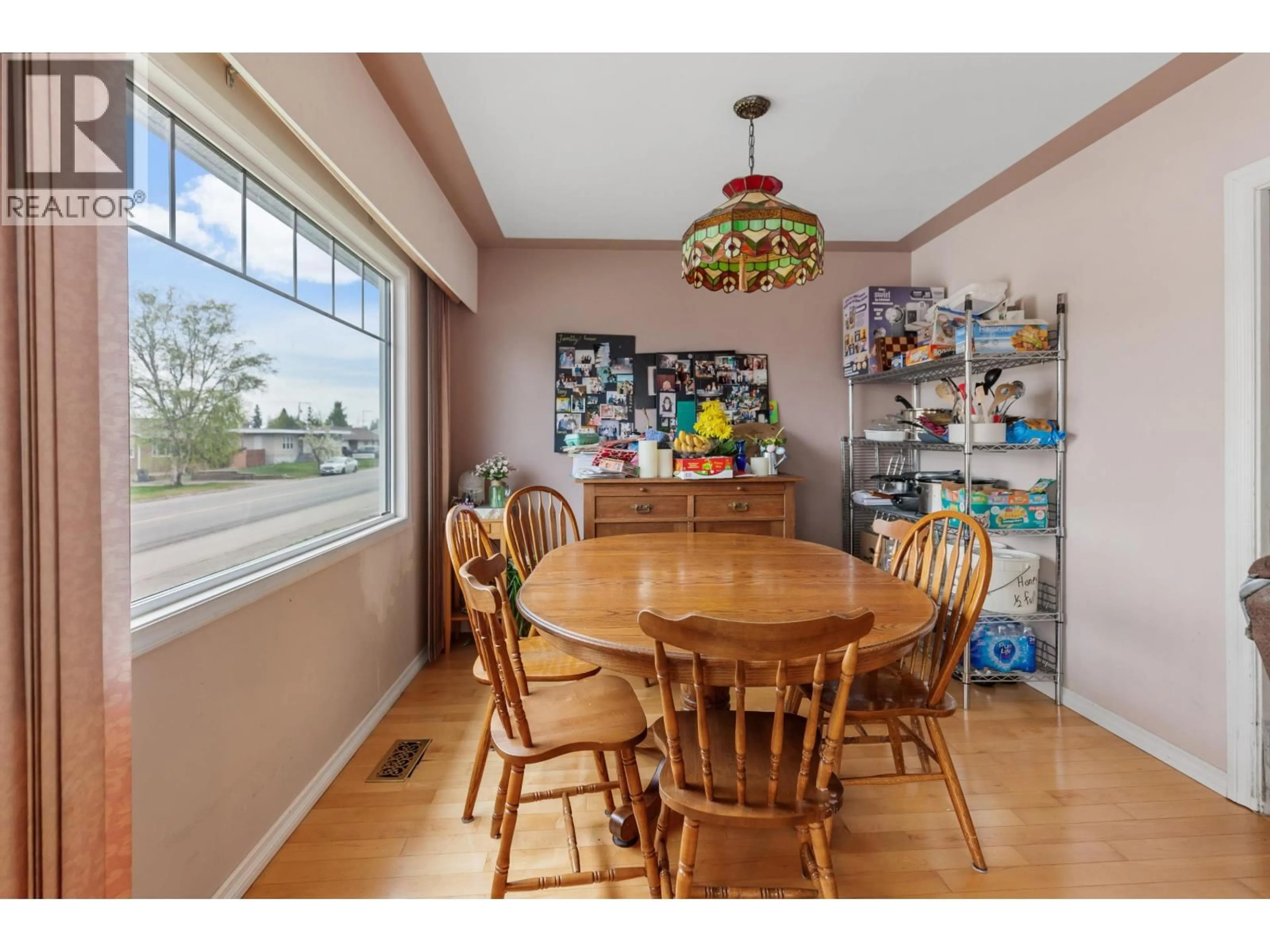 Dining room, wood/laminate floor for 1027 CARNEY STREET, Prince George British Columbia V2M2L1