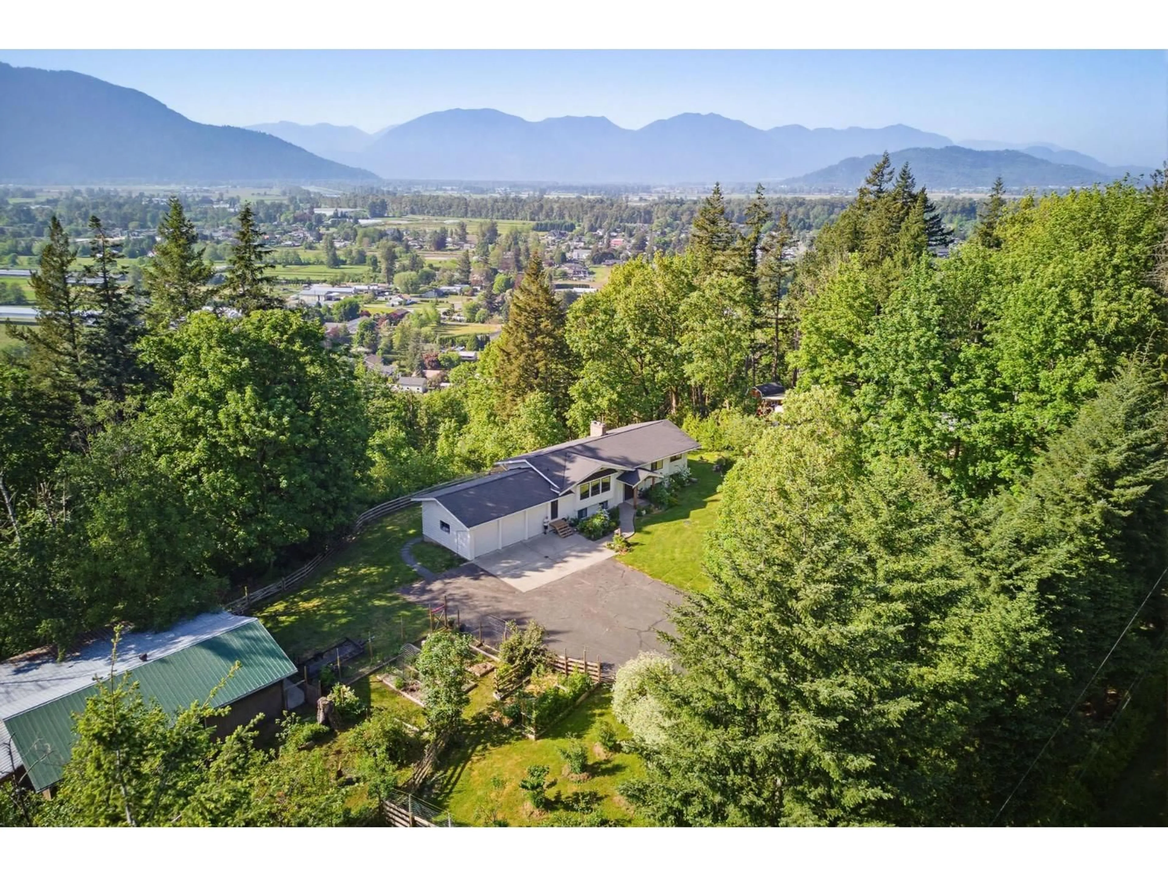 A pic from outside/outdoor area/front of a property/back of a property/a pic from drone, mountain view for 42299 HIGHLAND DRIVE, Yarrow British Columbia V2R5H2