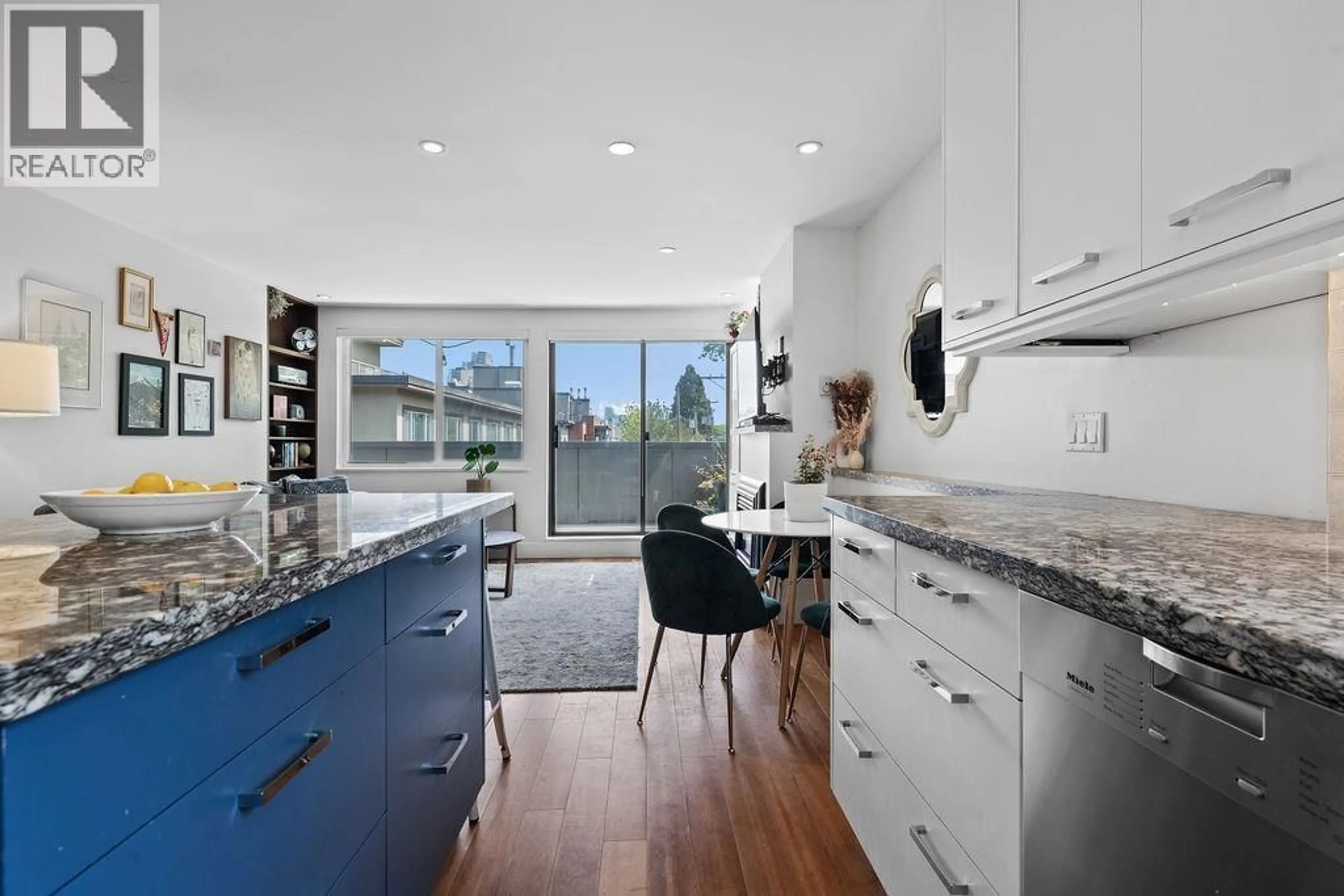 Open concept kitchen, ceramic/tile floor for 104 - 1512 YEW STREET, Vancouver British Columbia V6K3E4