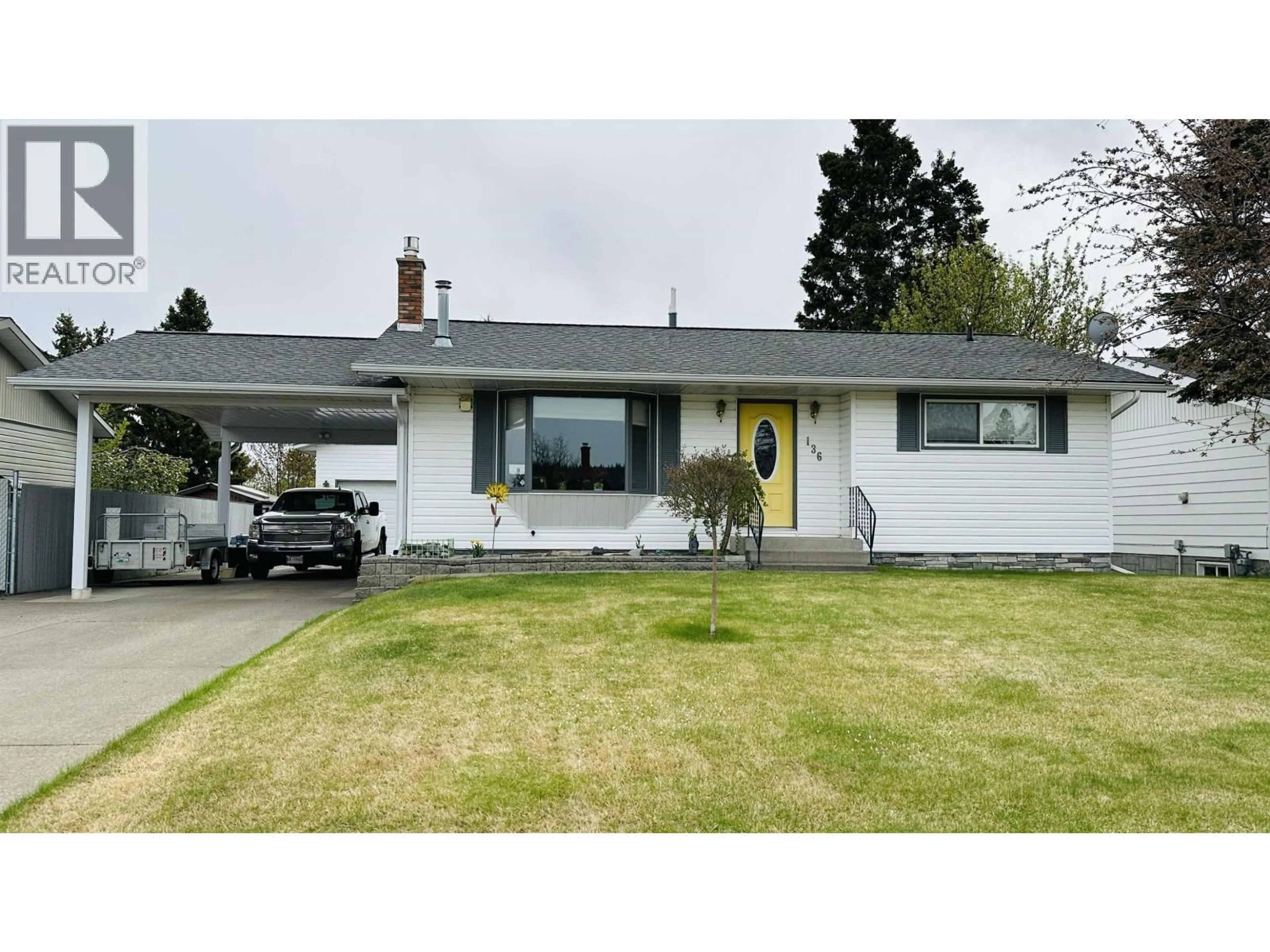 Home with vinyl exterior material, street for 136 PORTAGE STREET, Prince George British Columbia V2M4N4