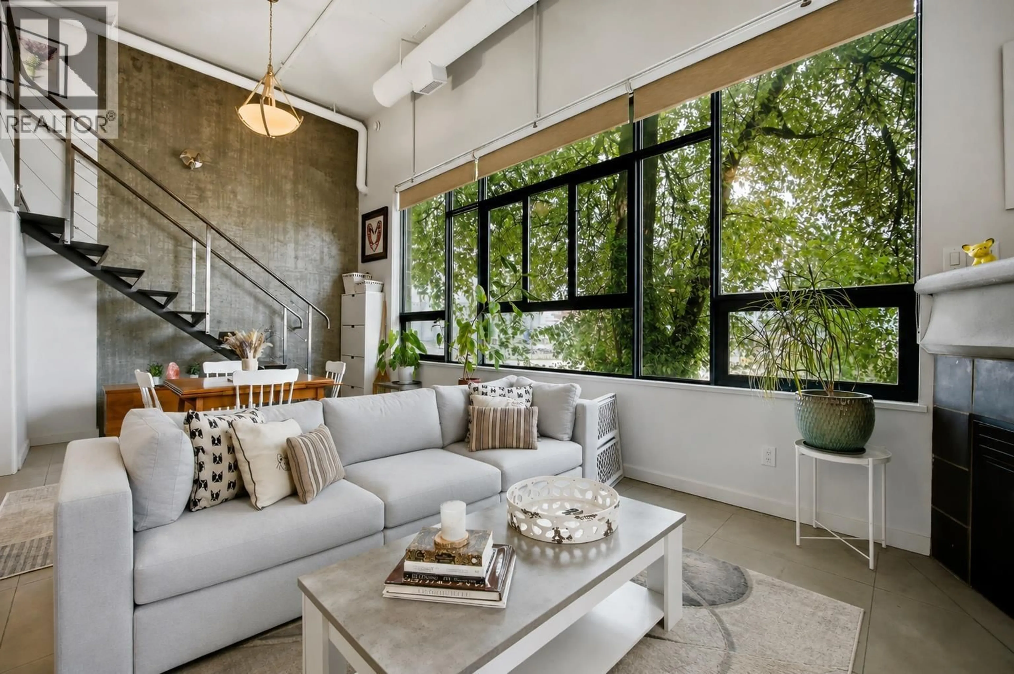Living room with furniture, cement floor for 314 - 2001 WALL STREET, Vancouver British Columbia V5L5E4