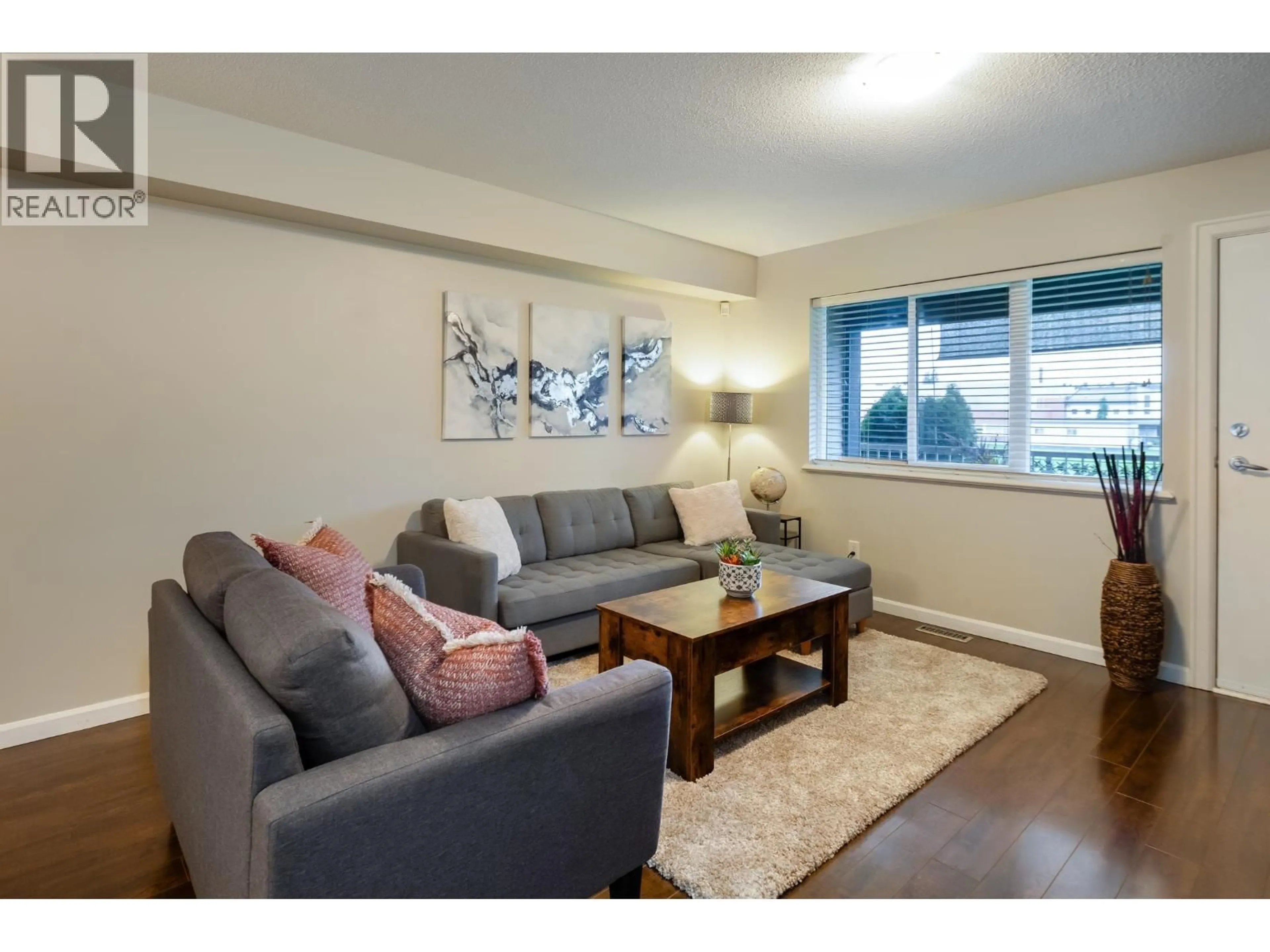 Living room with furniture, wood/laminate floor for 17 - 1268 RIVERSIDE DRIVE, Port Coquitlam British Columbia V3B0A8