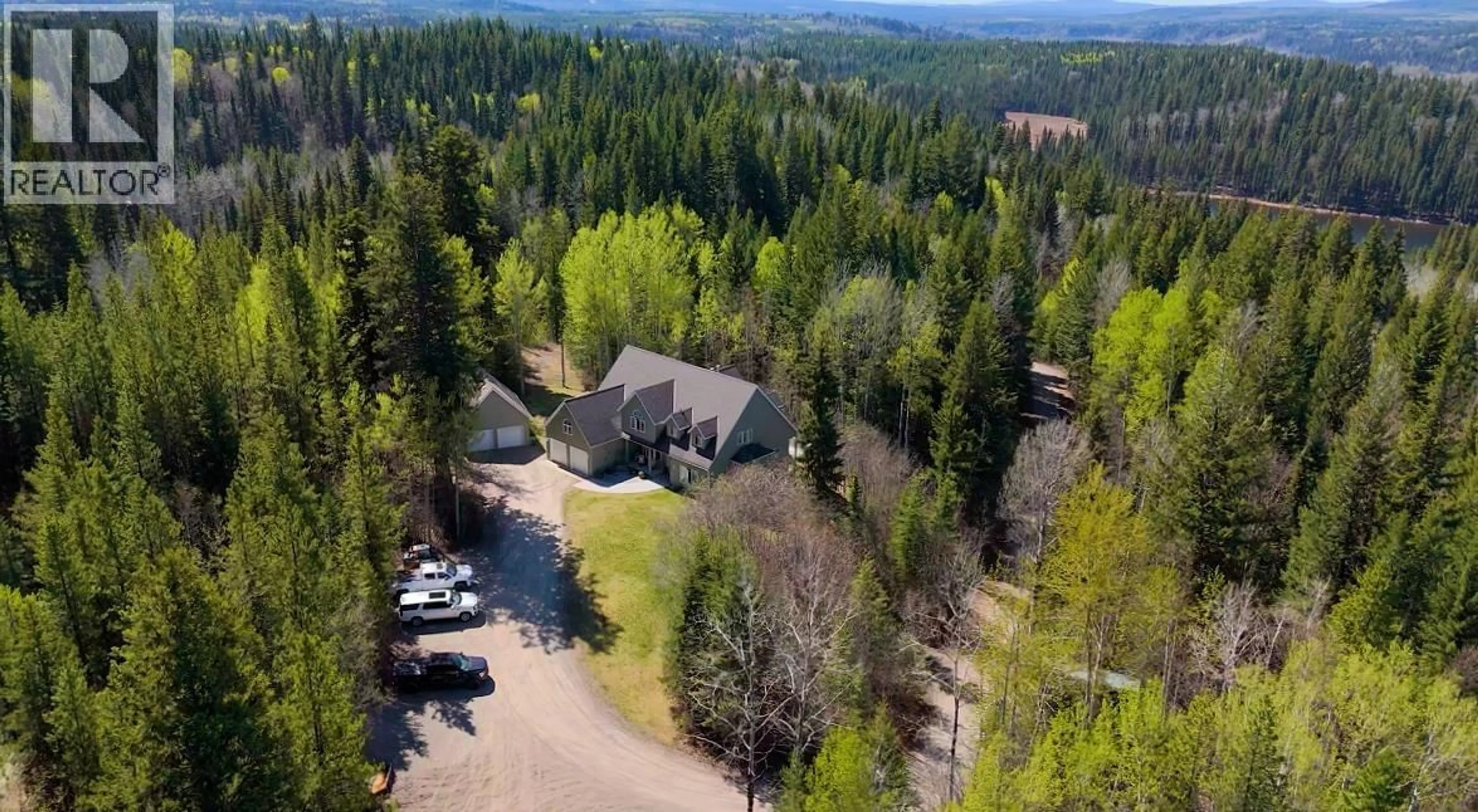 A pic from outside/outdoor area/front of a property/back of a property/a pic from drone, forest/trees view for 13800 BIG FIR ROAD, Prince George British Columbia V2N5B5