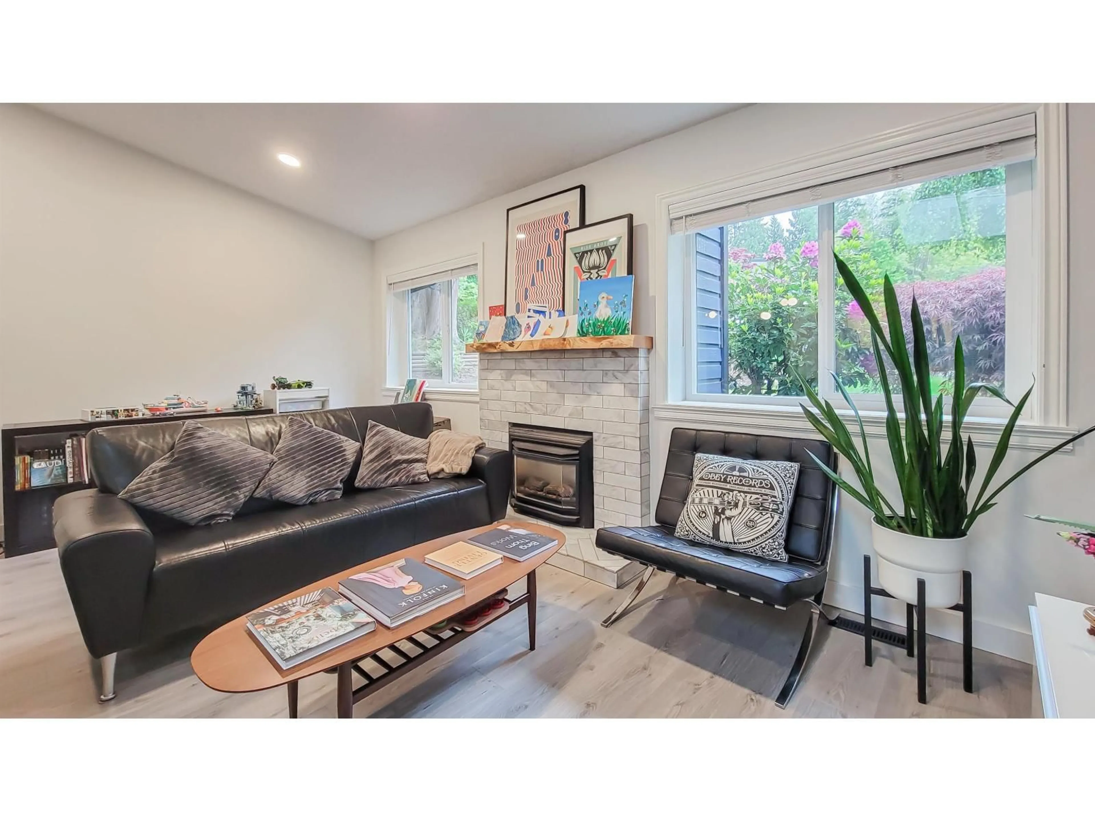 Living room with furniture, wood/laminate floor for 11083 PROSPECT DRIVE, Delta British Columbia V4E2R4