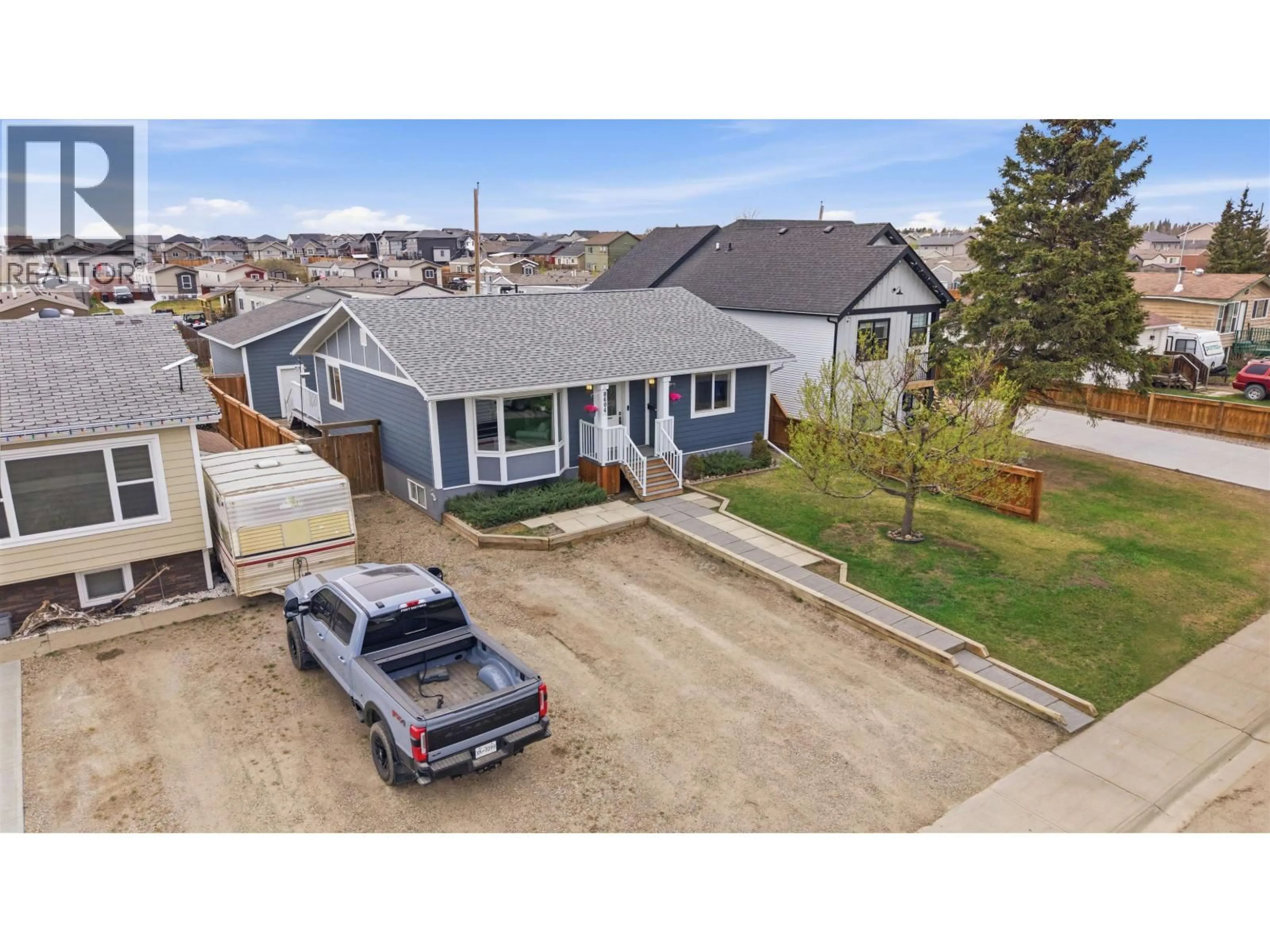 A pic from outside/outdoor area/front of a property/back of a property/a pic from drone, street for 8604 78A STREET, Fort St. John British Columbia V1J3B1