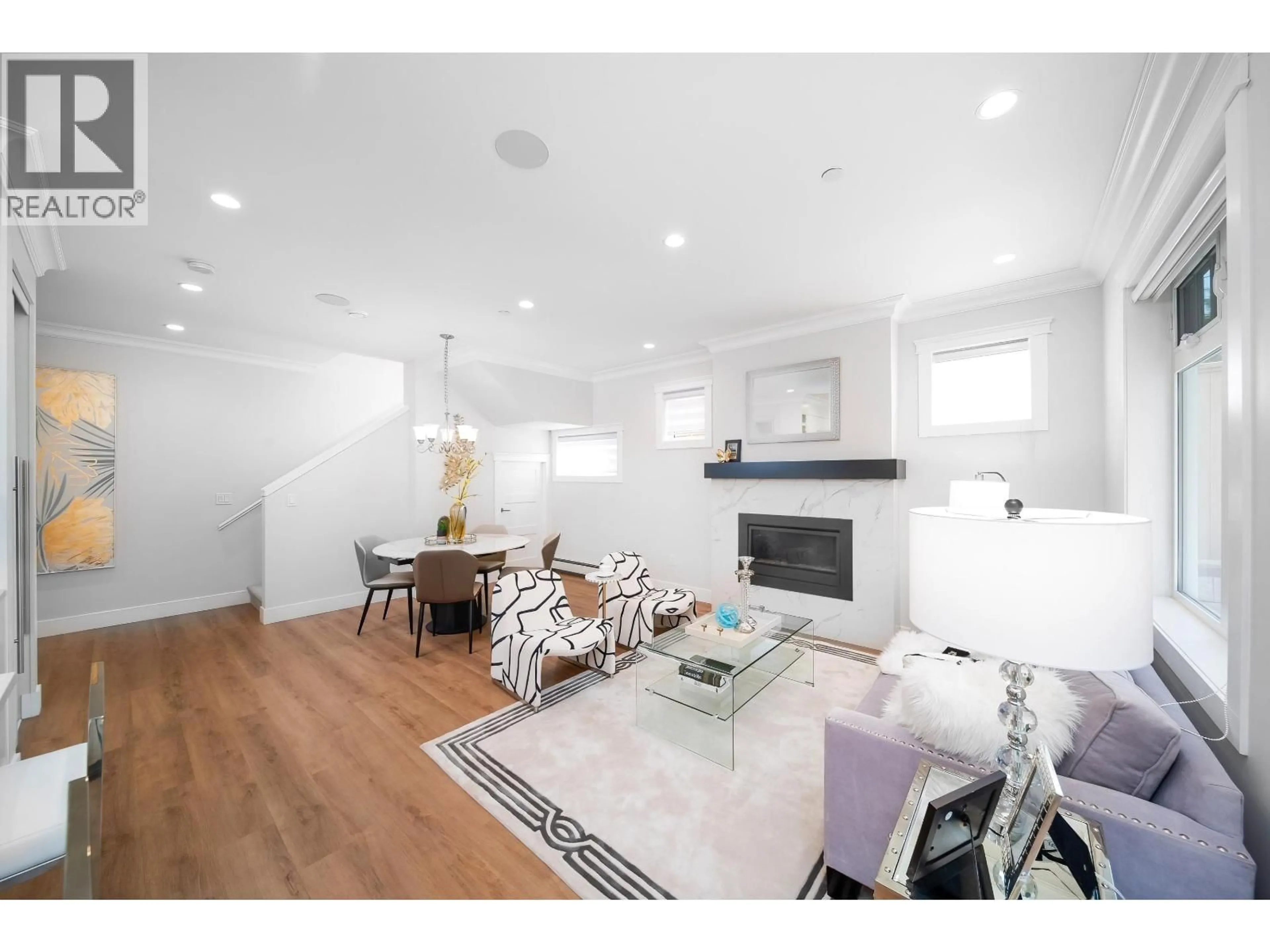 Living room with furniture, wood/laminate floor for 2753 ALMA STREET, Vancouver British Columbia V6R3S3