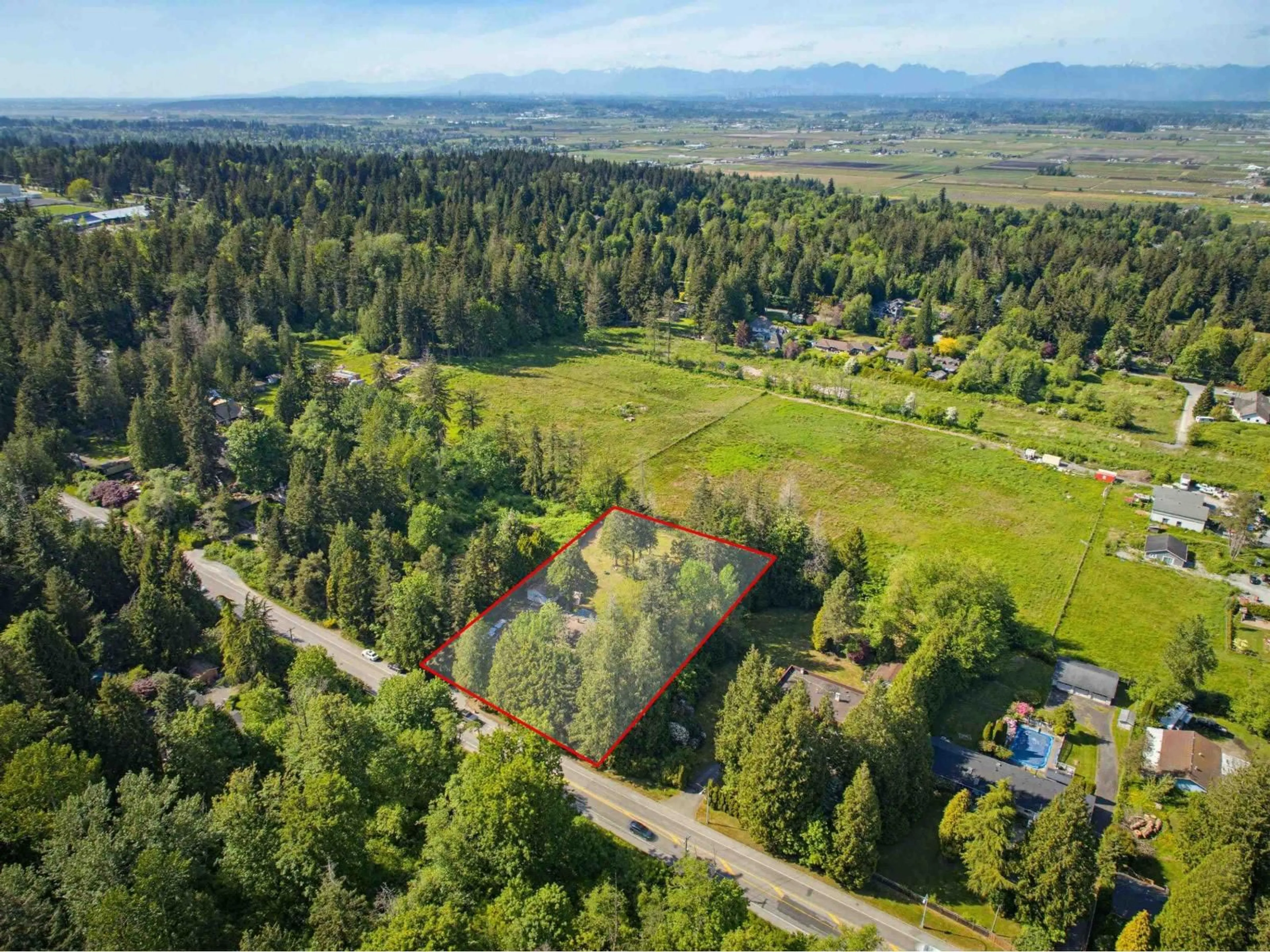 A pic from outside/outdoor area/front of a property/back of a property/a pic from drone, forest/trees view for 17495 24 AVENUE, Surrey British Columbia V3Z0A3