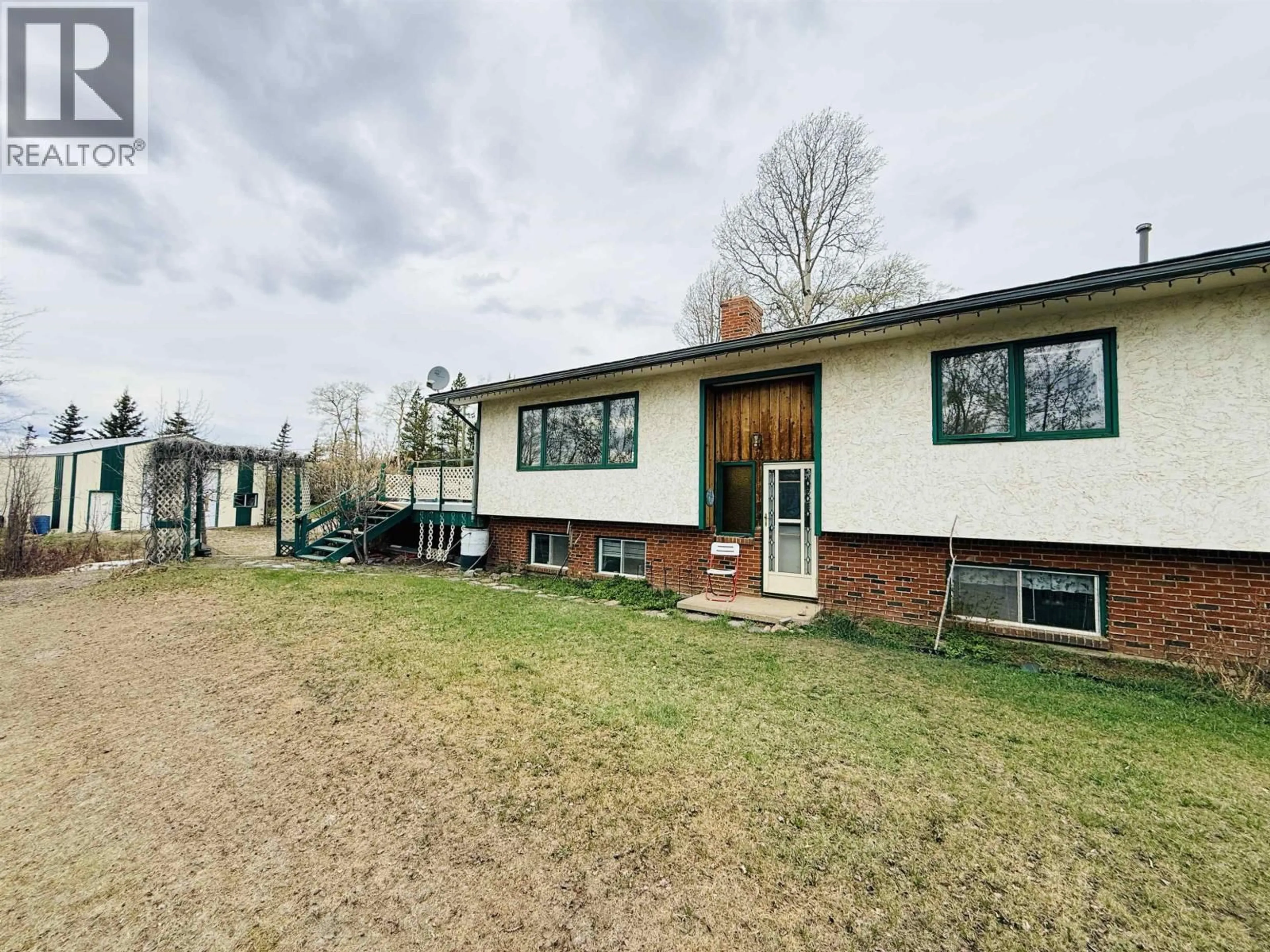 A pic from outside/outdoor area/front of a property/back of a property/a pic from drone, unknown for 12895 271 ROAD, Charlie Lake British Columbia V0C1H0