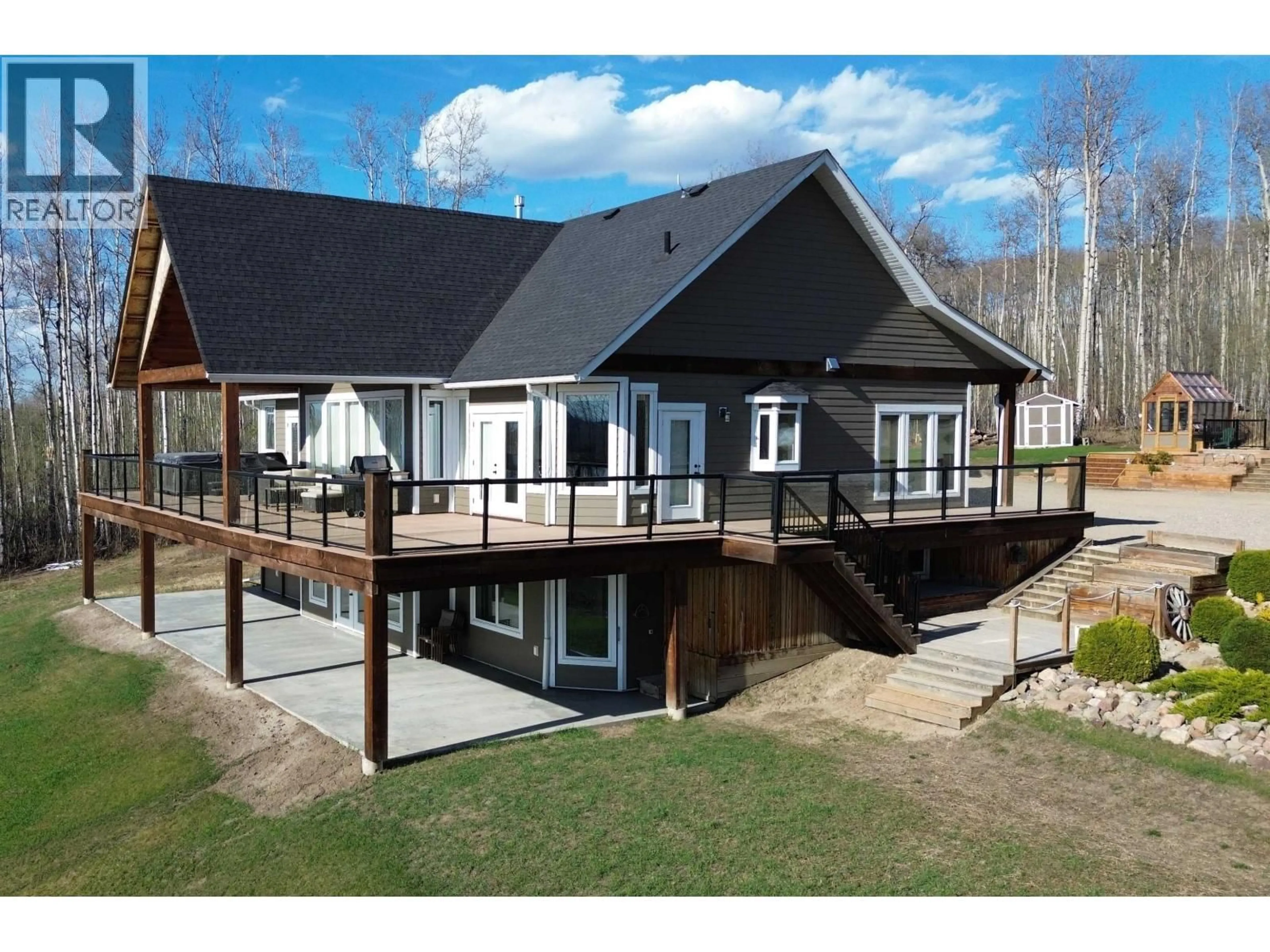 A pic from outside/outdoor area/front of a property/back of a property/a pic from drone, building for 13474 SUNNYSIDE DRIVE, Charlie Lake British Columbia V0C1H0