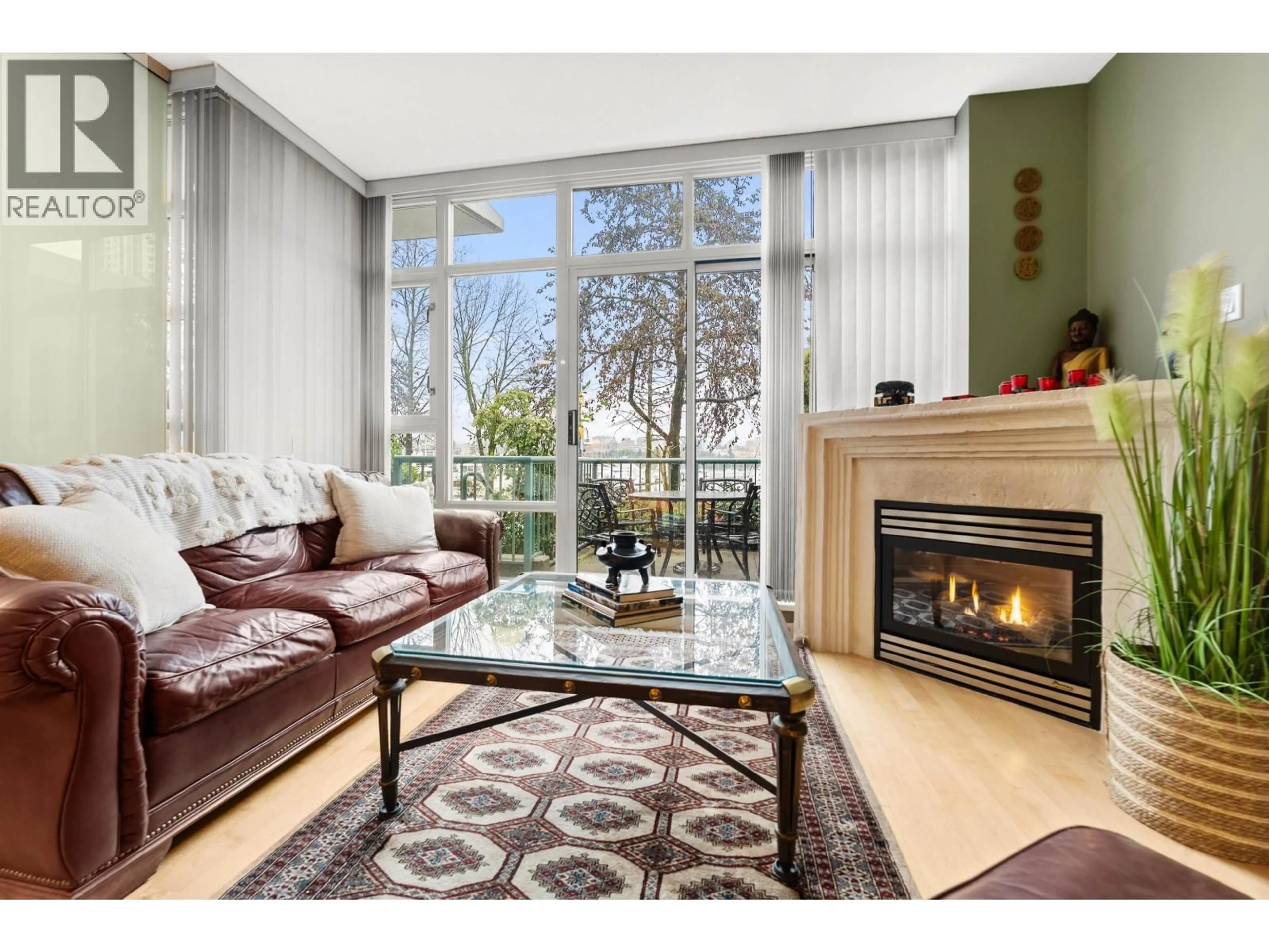Living room with furniture, wood/laminate floor for 1053 MARINASIDE CRESCENT, Vancouver British Columbia V6Z3A5