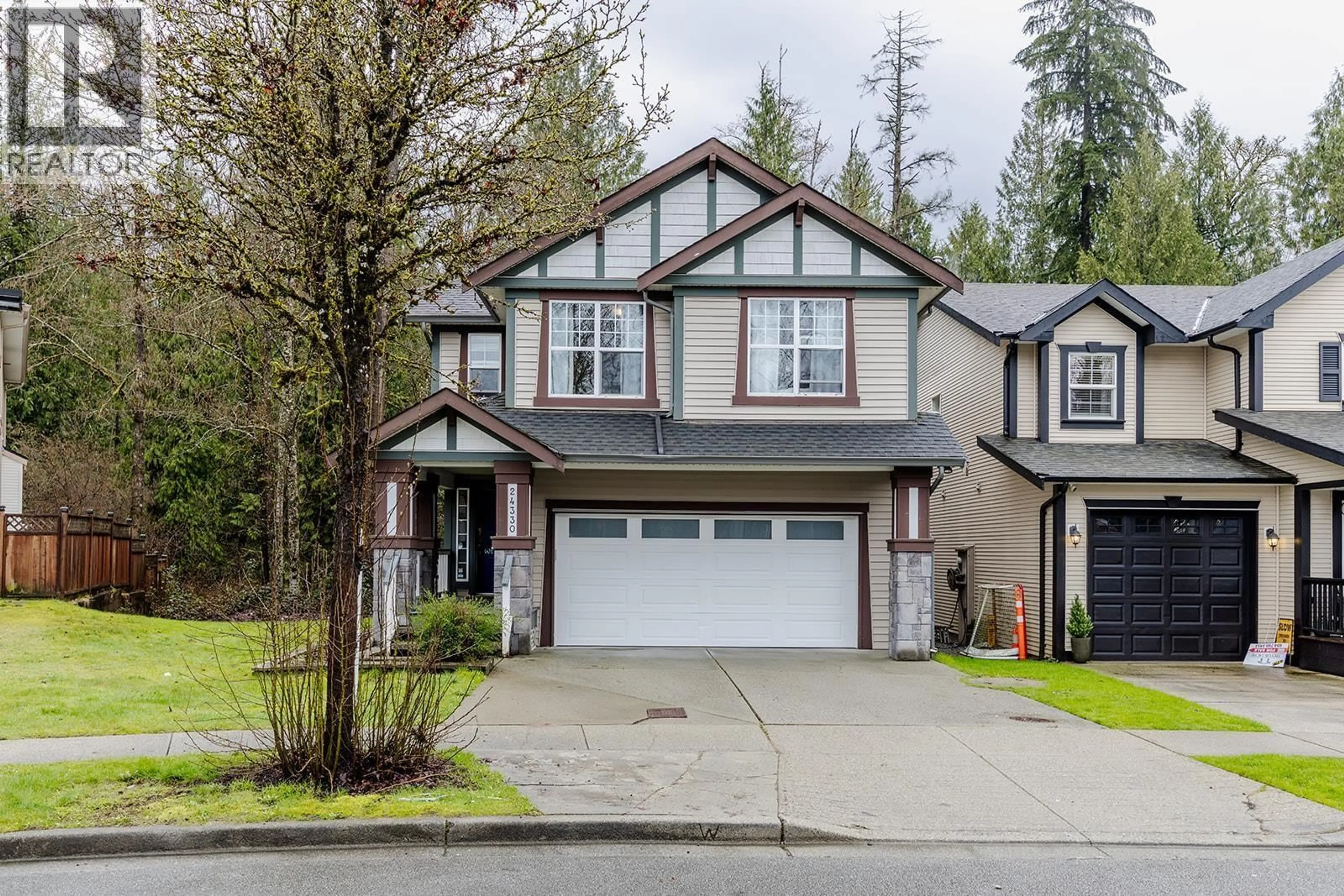 Home with vinyl exterior material, street for 24330 100B AVENUE, Maple Ridge British Columbia V2W1X3