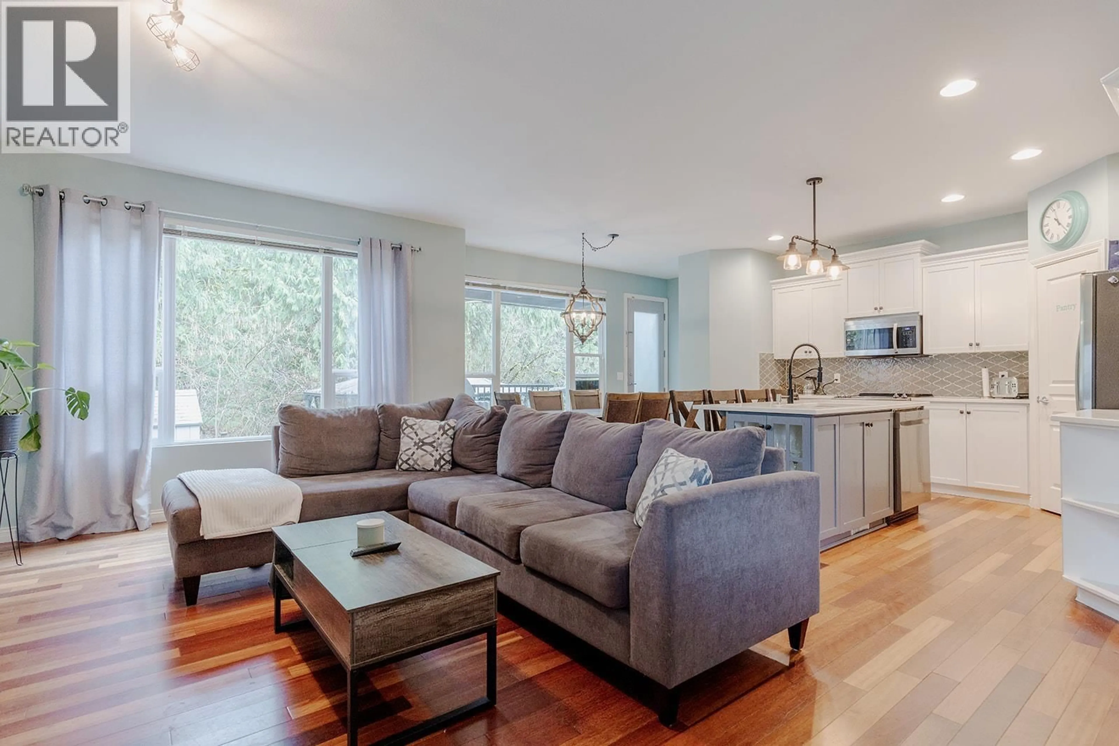 Living room with furniture, wood/laminate floor for 24330 100B AVENUE, Maple Ridge British Columbia V2W1X3
