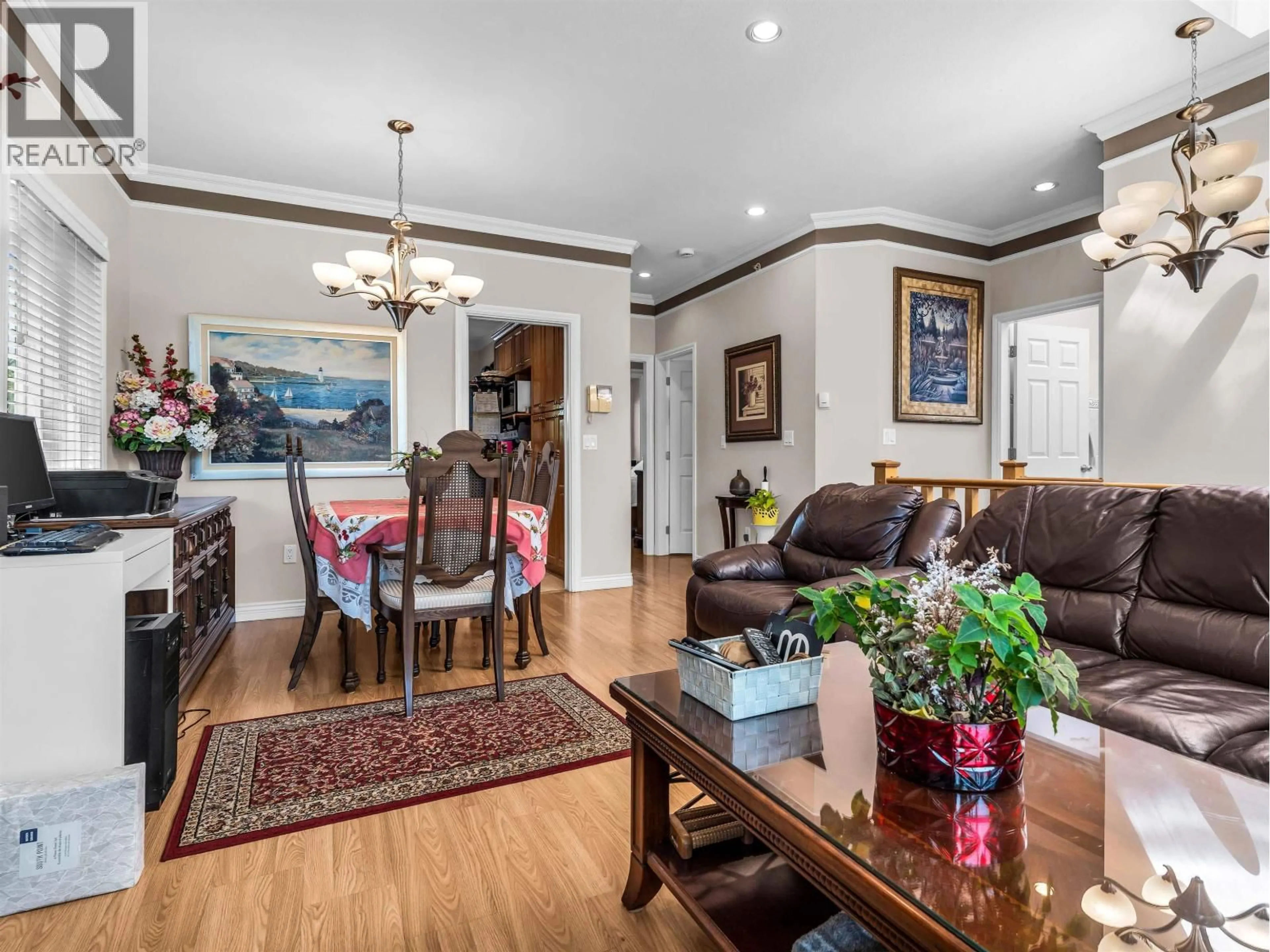 Living room with furniture, wood/laminate floor for 3021 29TH AVENUE, Vancouver British Columbia V5R1V9