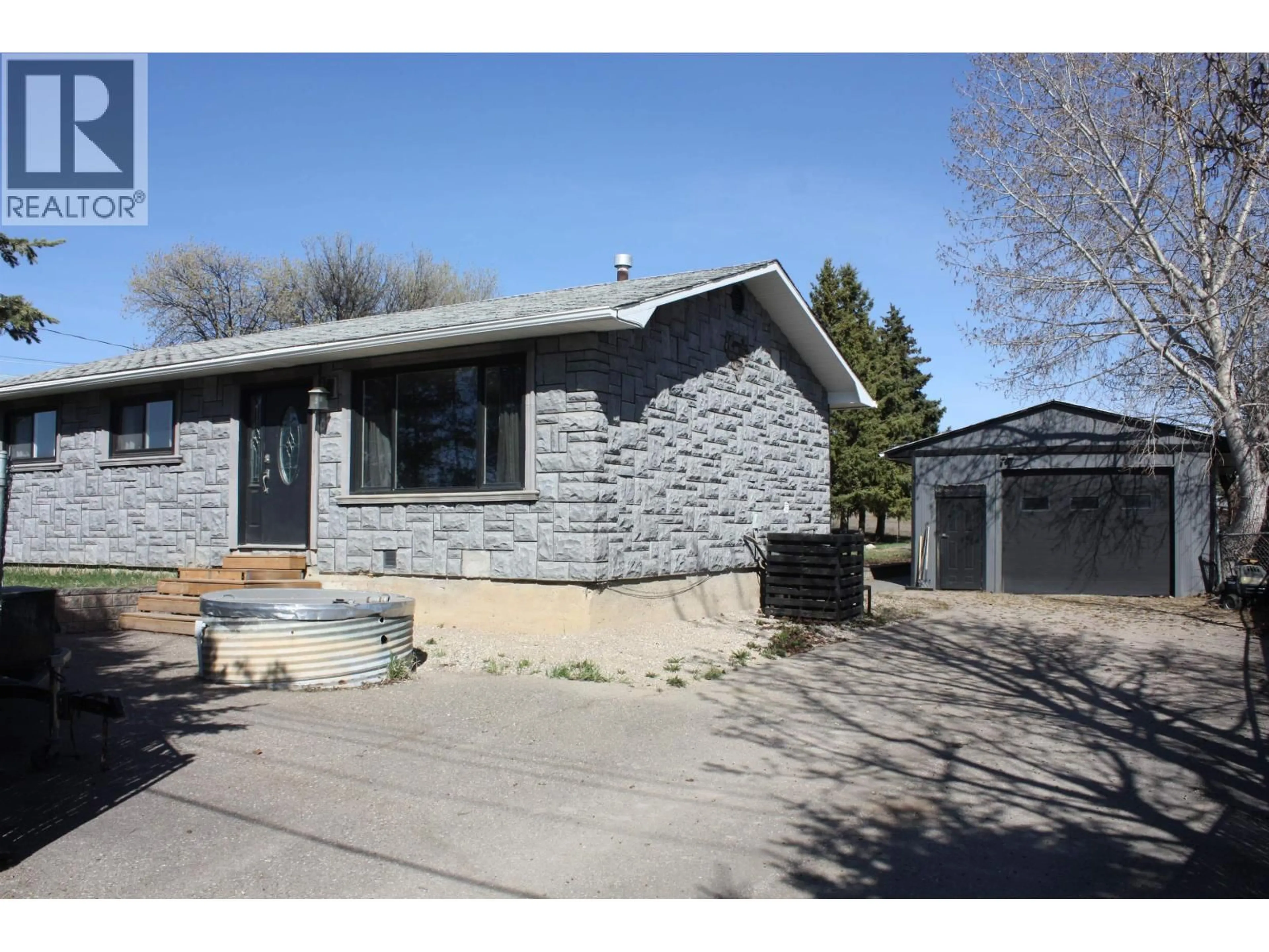 Home with brick exterior material, street for 8824 PINE ROAD, Fort St. John British Columbia V1J4M7