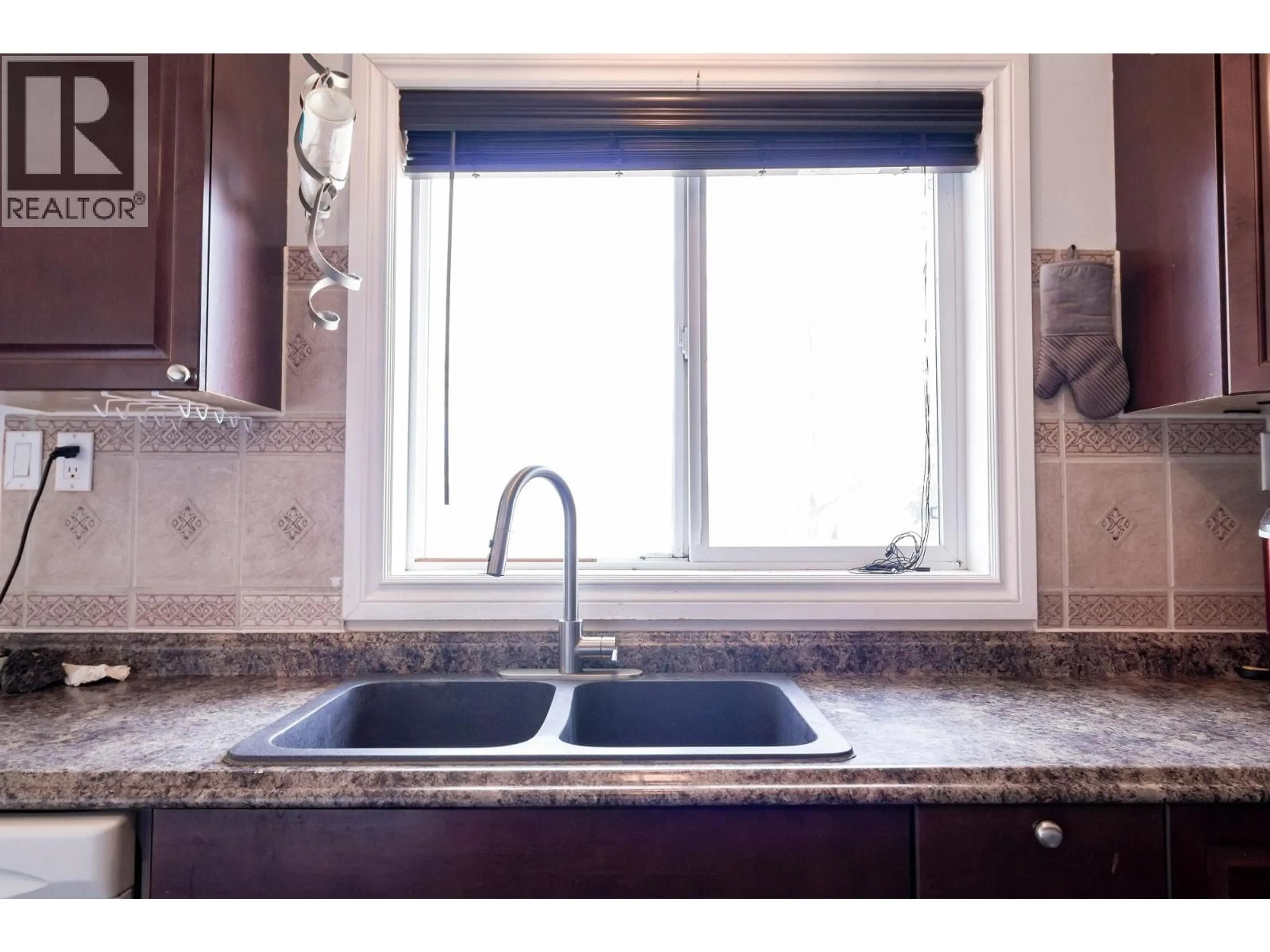 Standard kitchen, ceramic/tile floor for 9016 77 STREET, Fort St. John British Columbia V1J3A6
