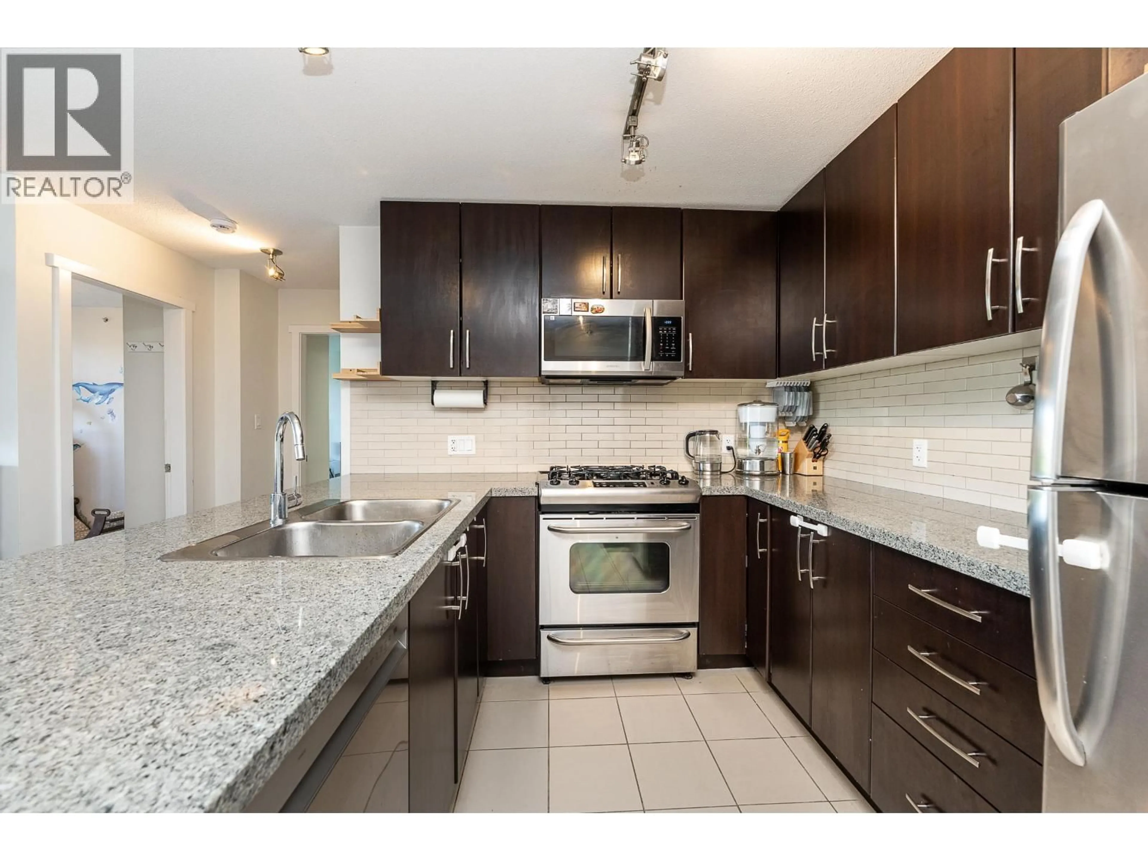 Open concept kitchen, unknown for 605 - 660 NOOTKA WAY, Port Moody British Columbia V3H0B7