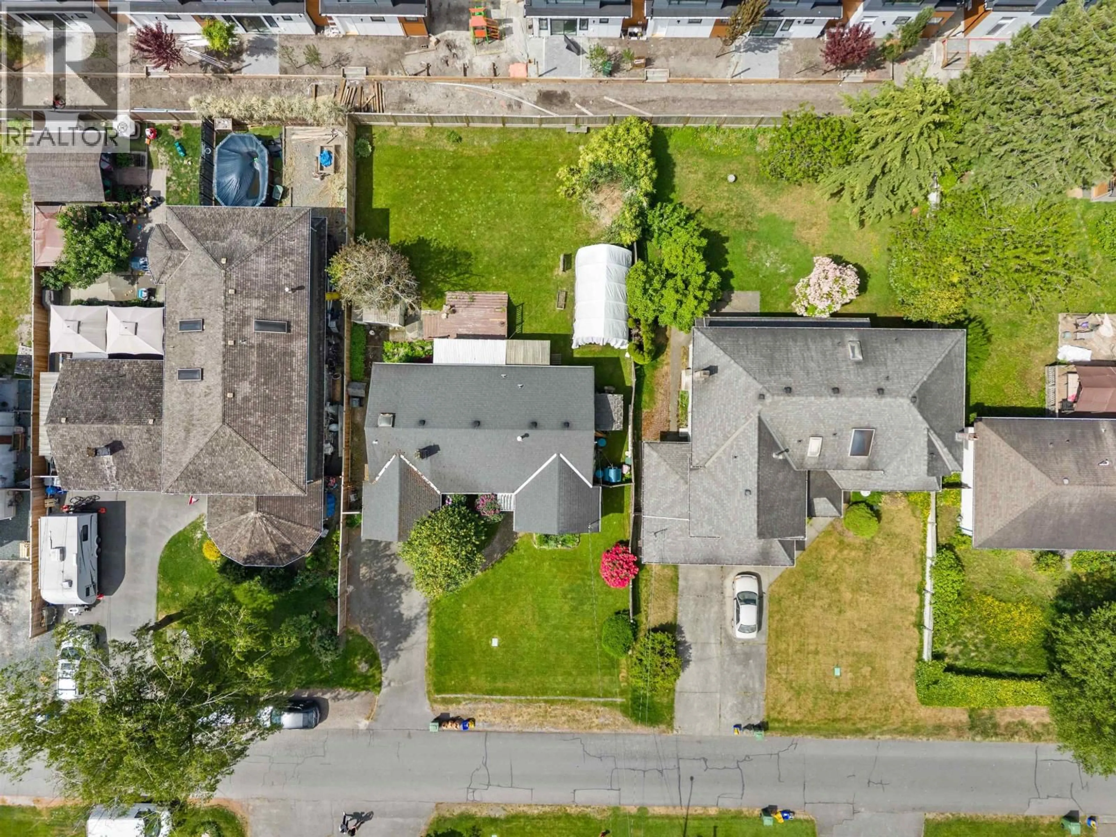 A pic from outside/outdoor area/front of a property/back of a property/a pic from drone, street for 10271 DENNIS CRESCENT, Richmond British Columbia V7A3R9