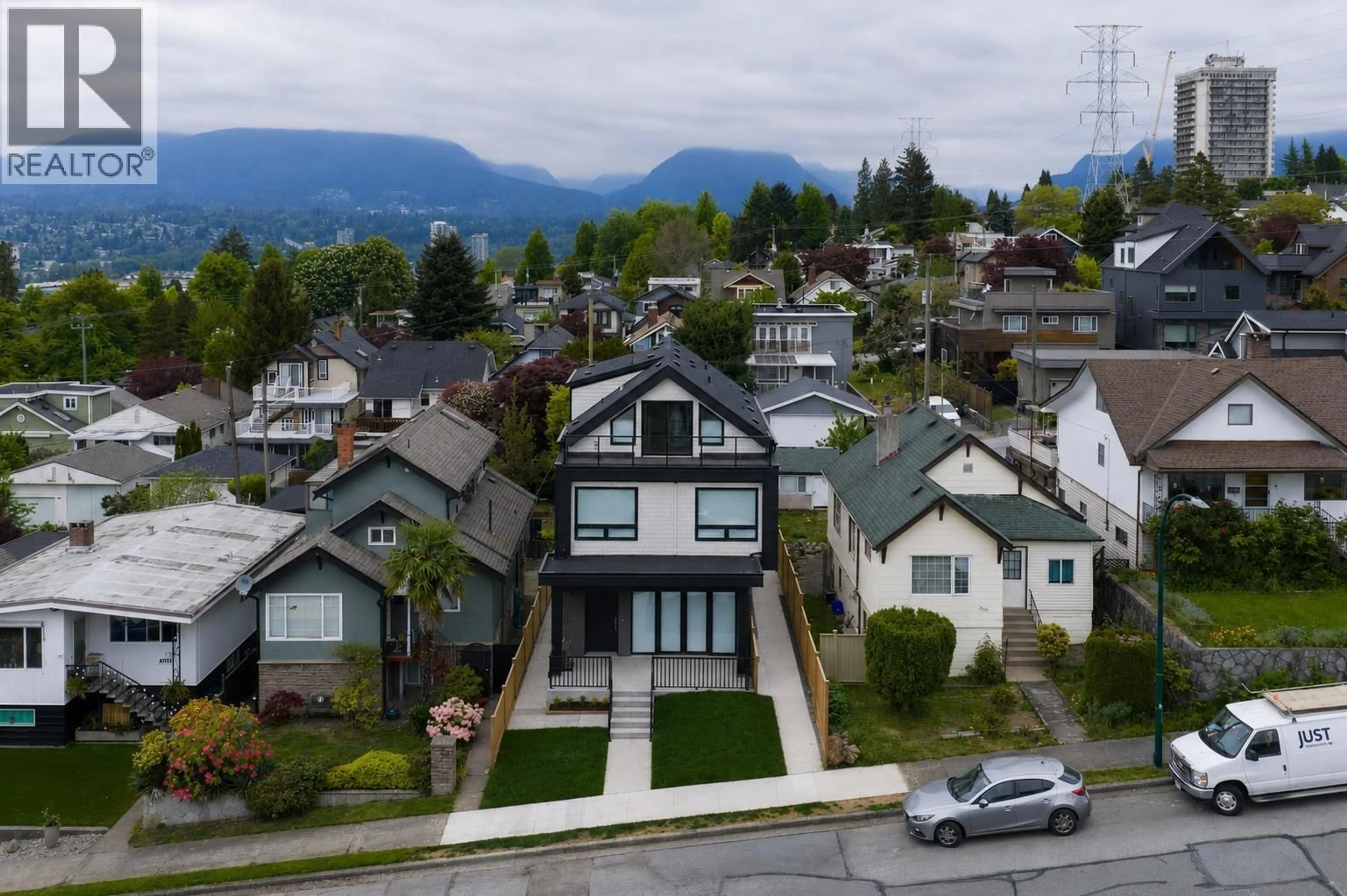 A pic from outside/outdoor area/front of a property/back of a property/a pic from drone, mountain view for 1 - 3645 DUNDAS STREET, Vancouver British Columbia V5K1S3