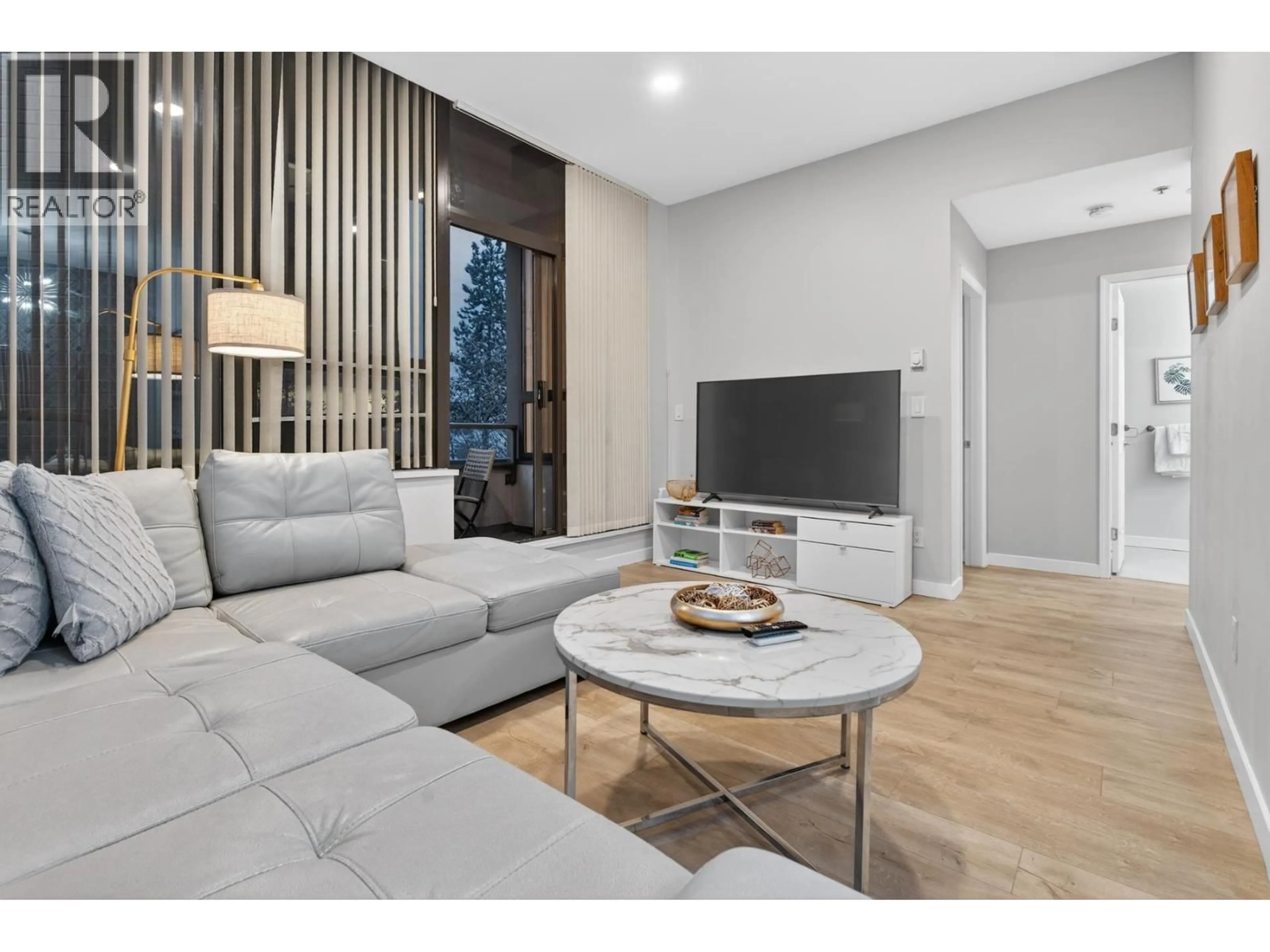 Living room with furniture, wood/laminate floor for 311 - 1010 HOWE STREET, Vancouver British Columbia V6Z1P5