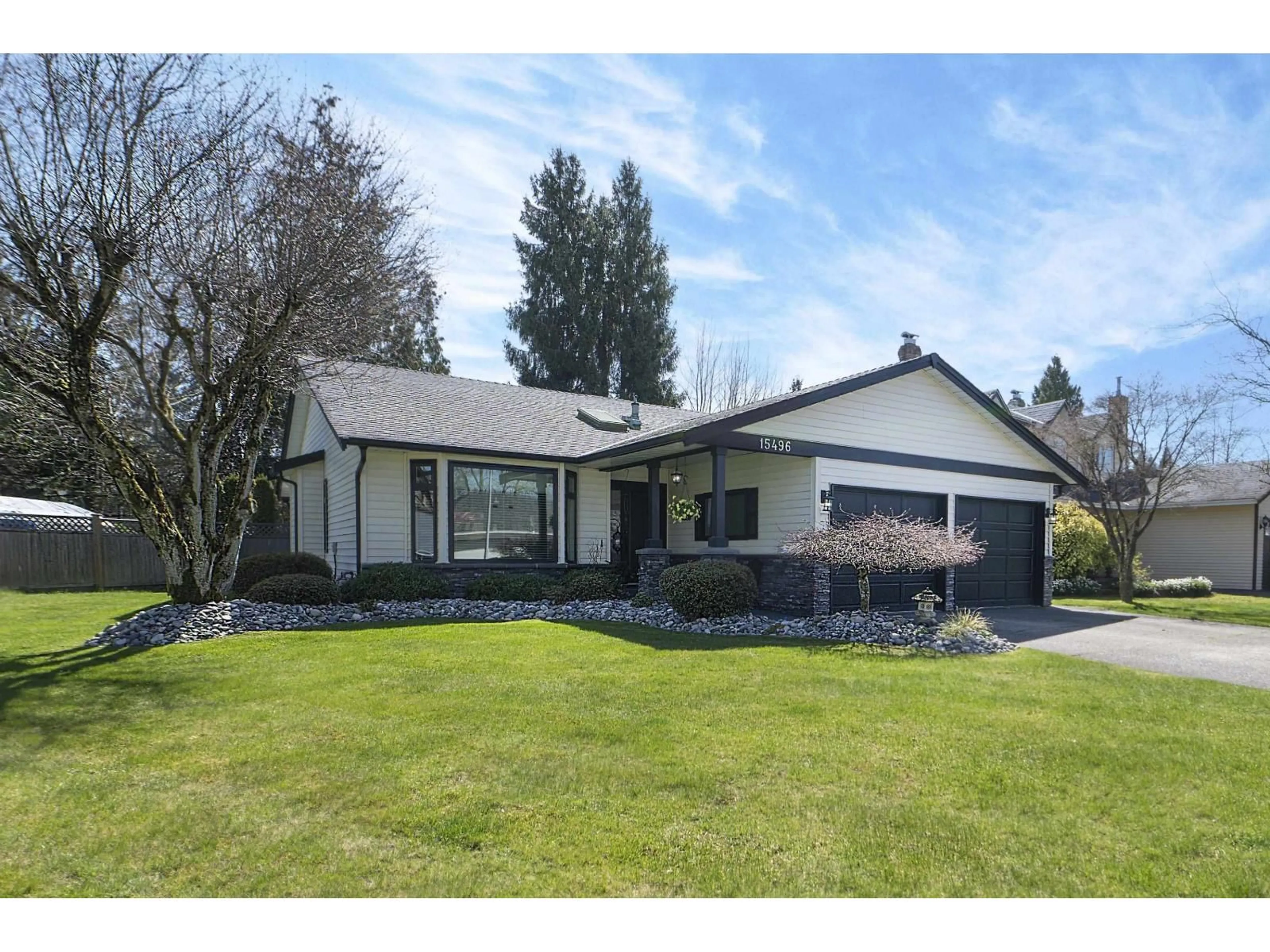 Home with vinyl exterior material, street for 15496 93RD AVENUE, Surrey British Columbia V3R9B6