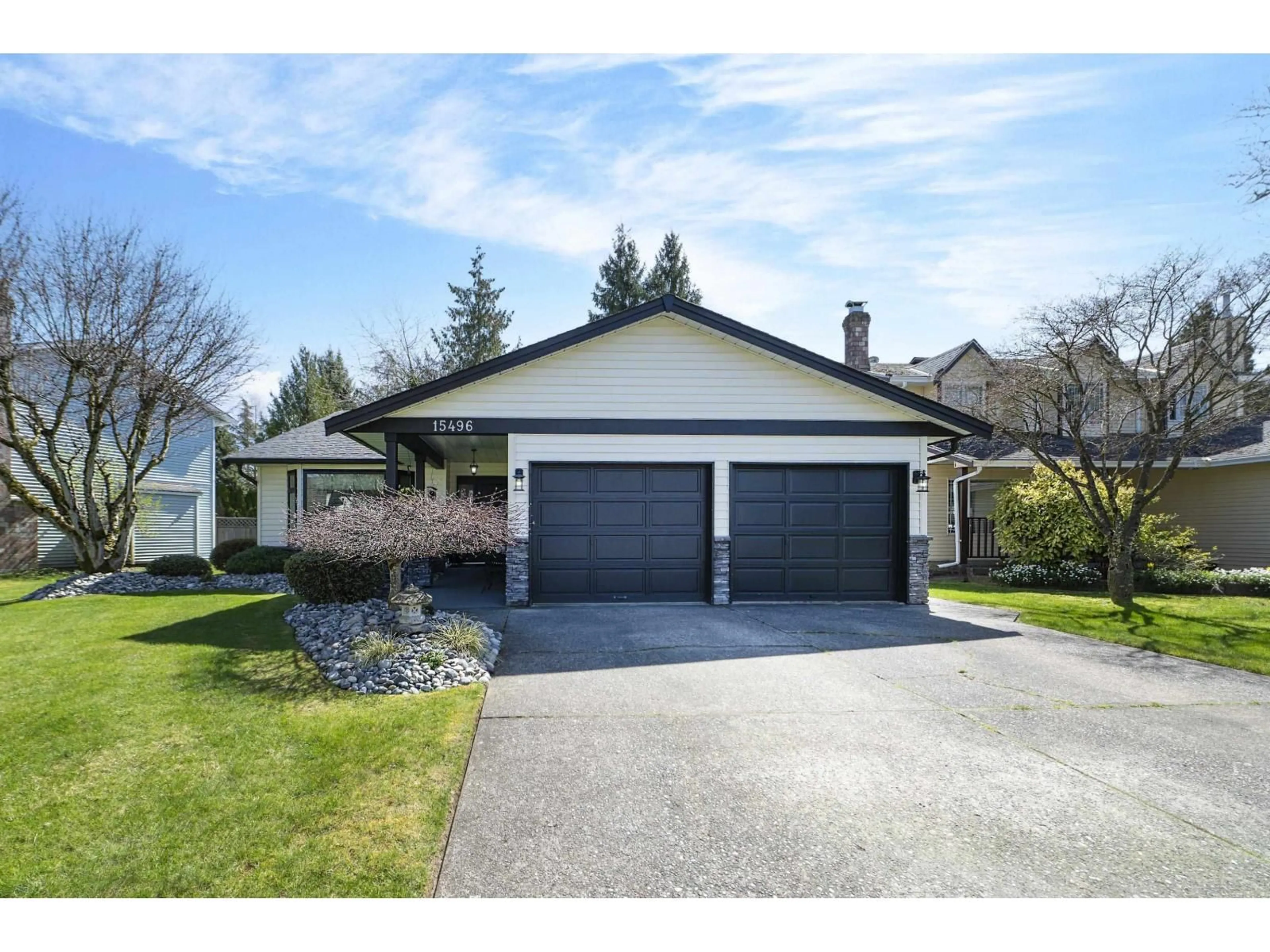 Home with vinyl exterior material, street for 15496 93RD AVENUE, Surrey British Columbia V3R9B6