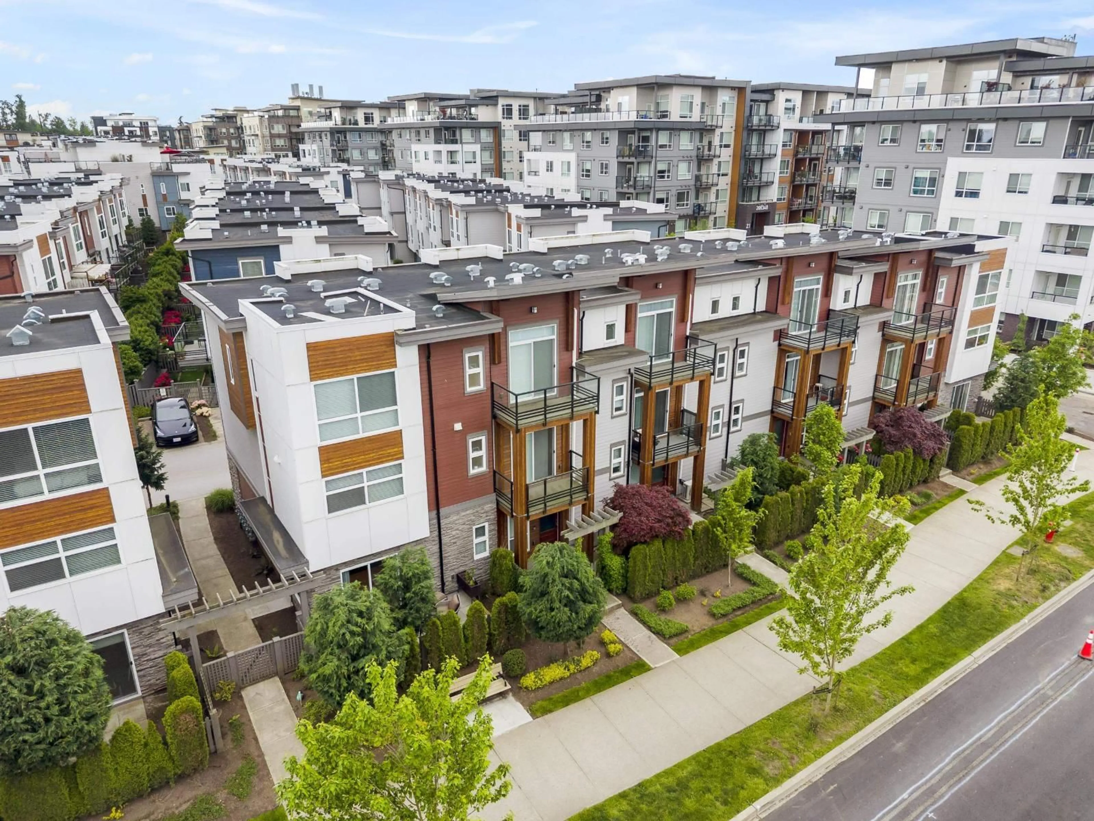 A pic from outside/outdoor area/front of a property/back of a property/a pic from drone, city buildings view from balcony for 97 - 7947 209 STREET, Langley British Columbia V2Y0Y6