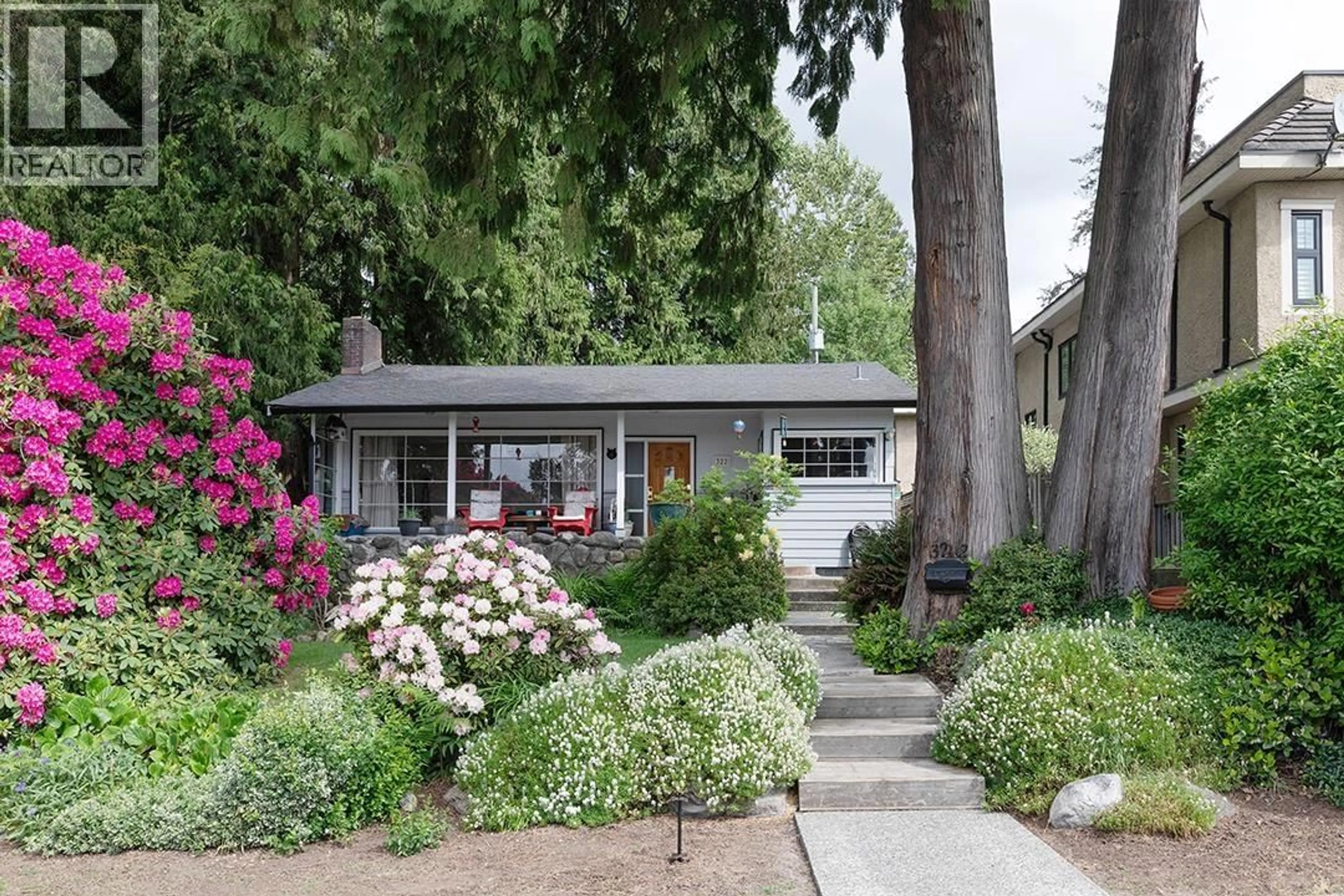 Home with vinyl exterior material, street for 322 25TH STREET, North Vancouver British Columbia V7N1A3