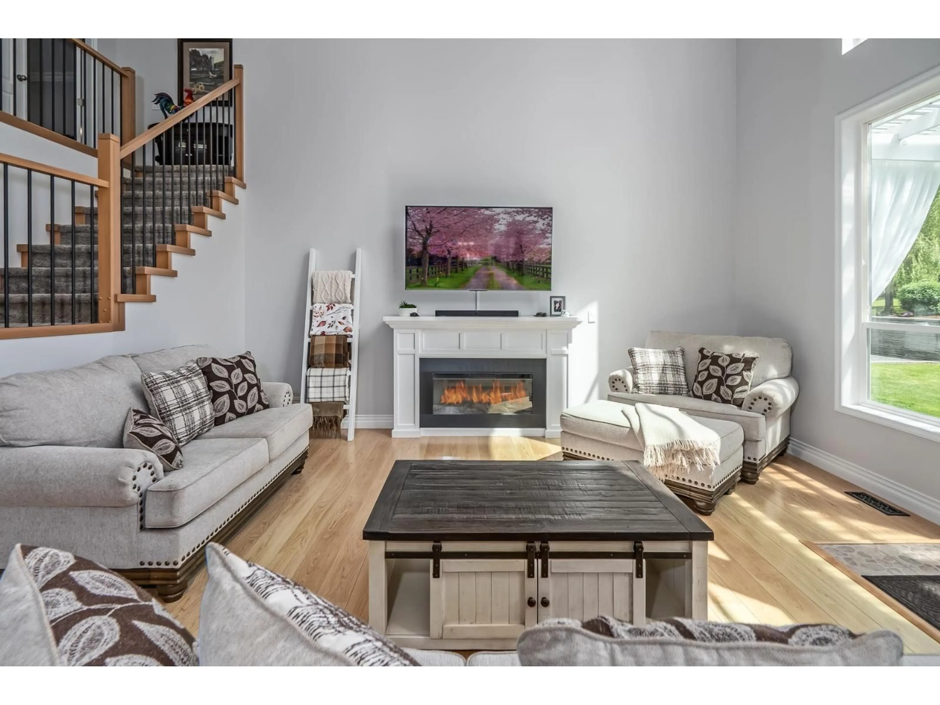 Living room with furniture, wood/laminate floor for 41932 MAPLE LANE, Yarrow British Columbia V2R5G9