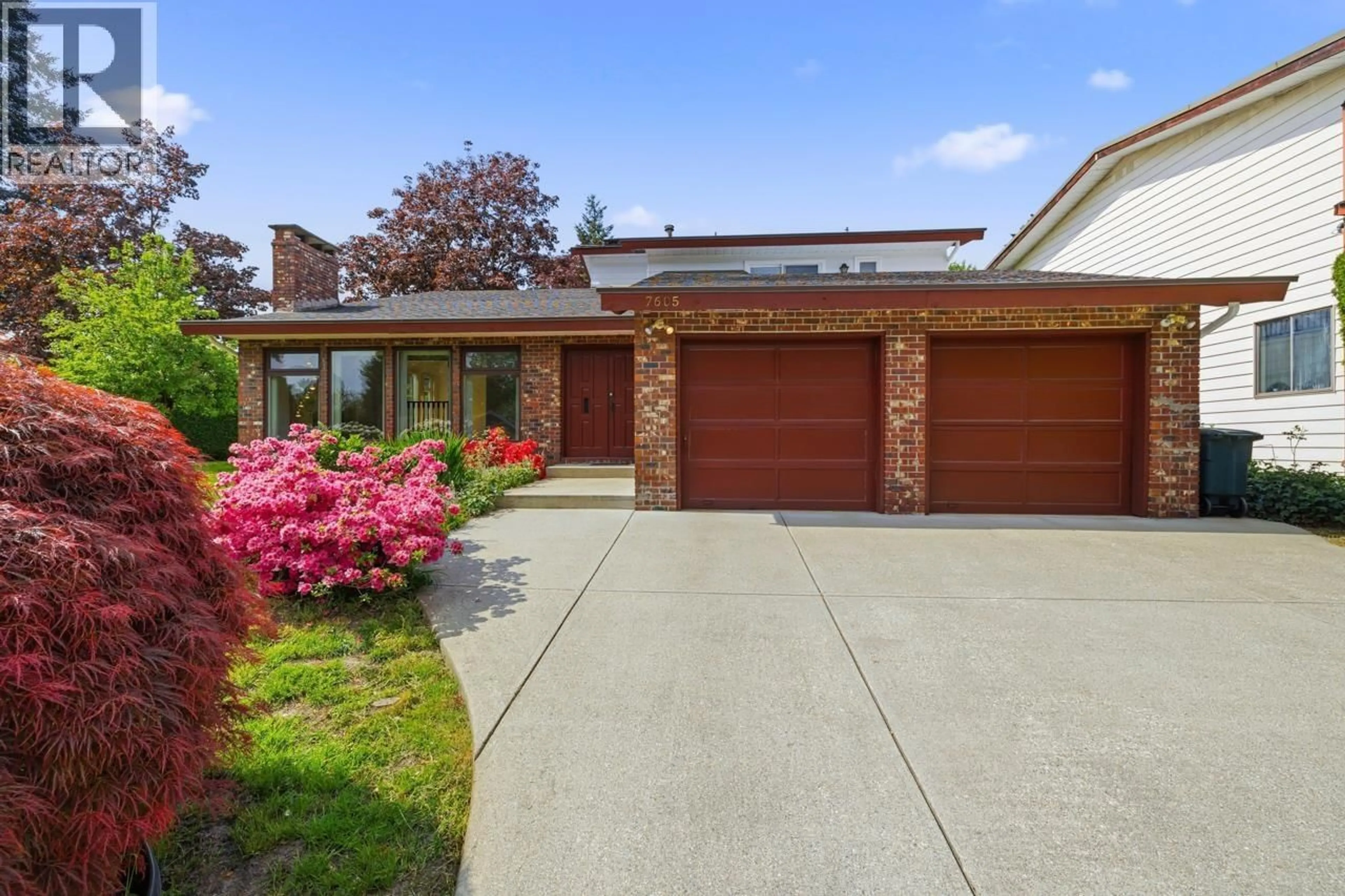 Home with brick exterior material, street for 7605 LAWRENCE DRIVE, Burnaby British Columbia V5A3M6