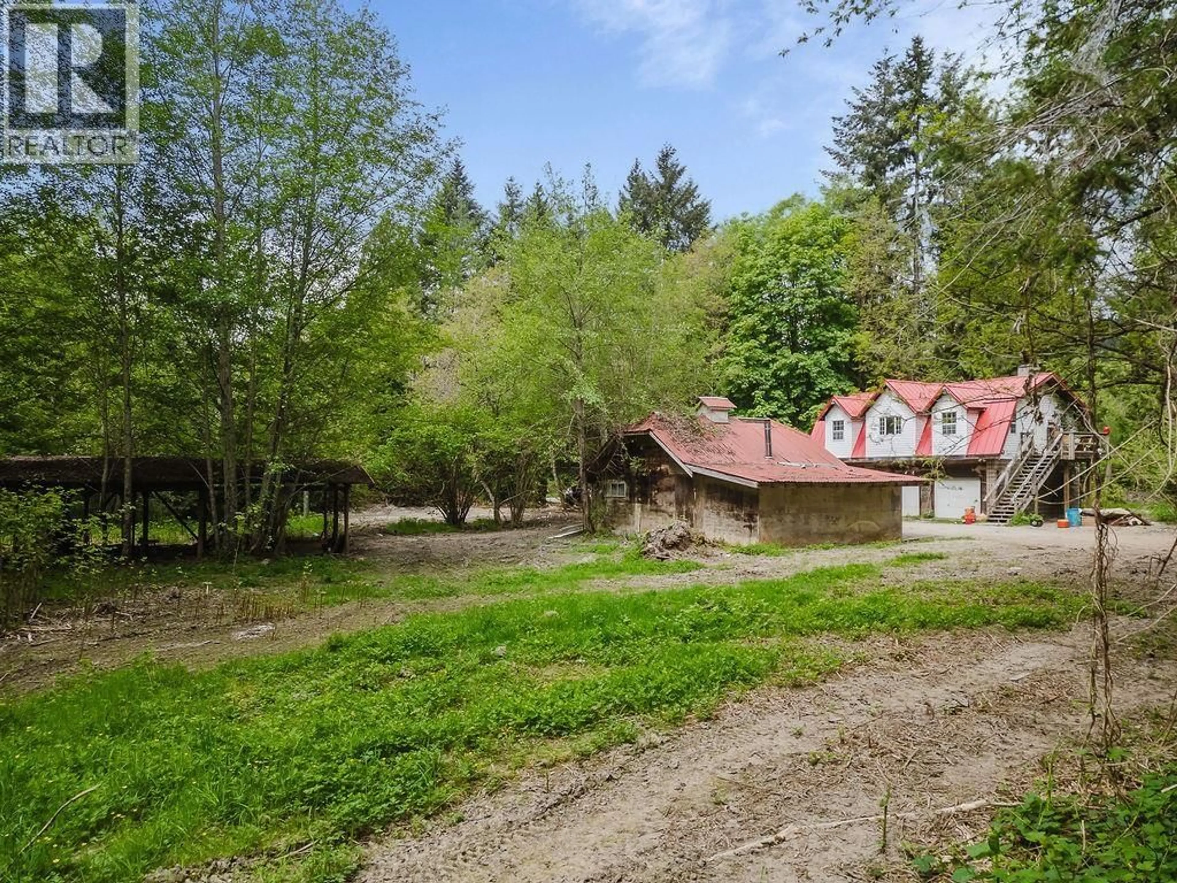 A pic from outside/outdoor area/front of a property/back of a property/a pic from drone, forest/trees view for 1575 BURTON ROAD, Gibsons British Columbia V0N1V2
