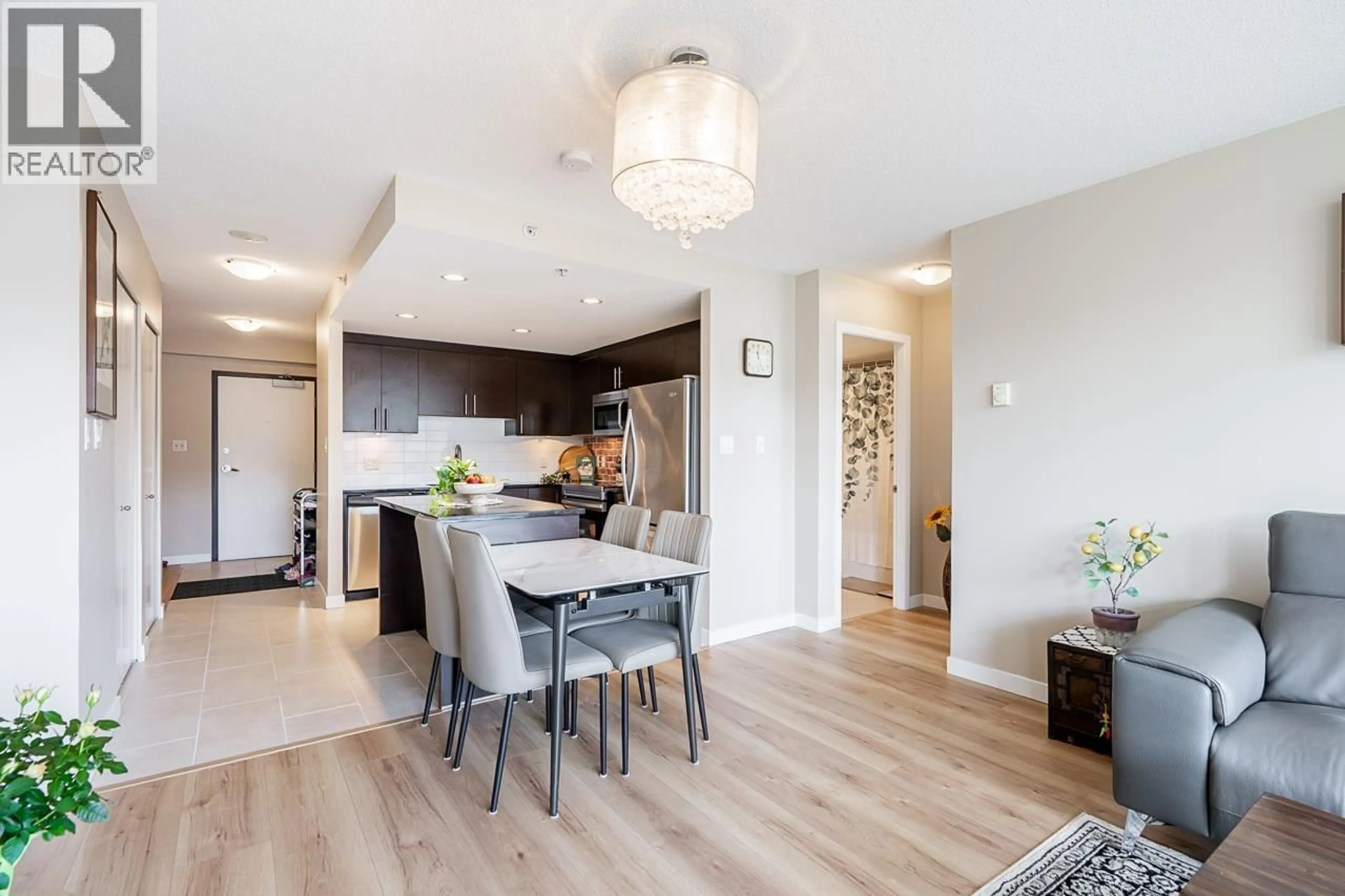 Open concept kitchen, wood/laminate floor for 304 - 575 DELESTRE AVENUE, Coquitlam British Columbia V3K0A6