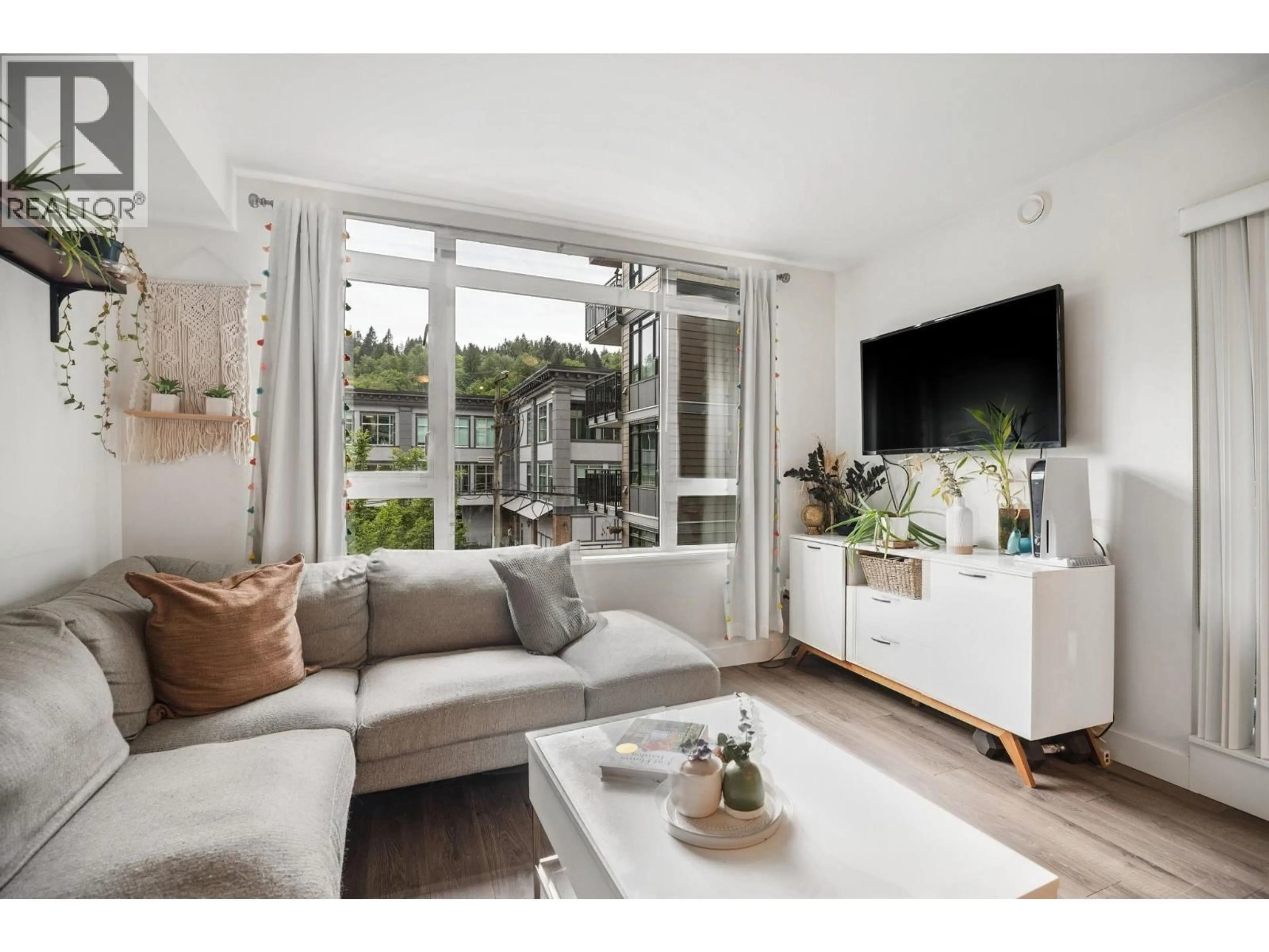Living room with furniture, unknown for 302 - 2525 CLARKE STREET, Port Moody British Columbia V3H0J3