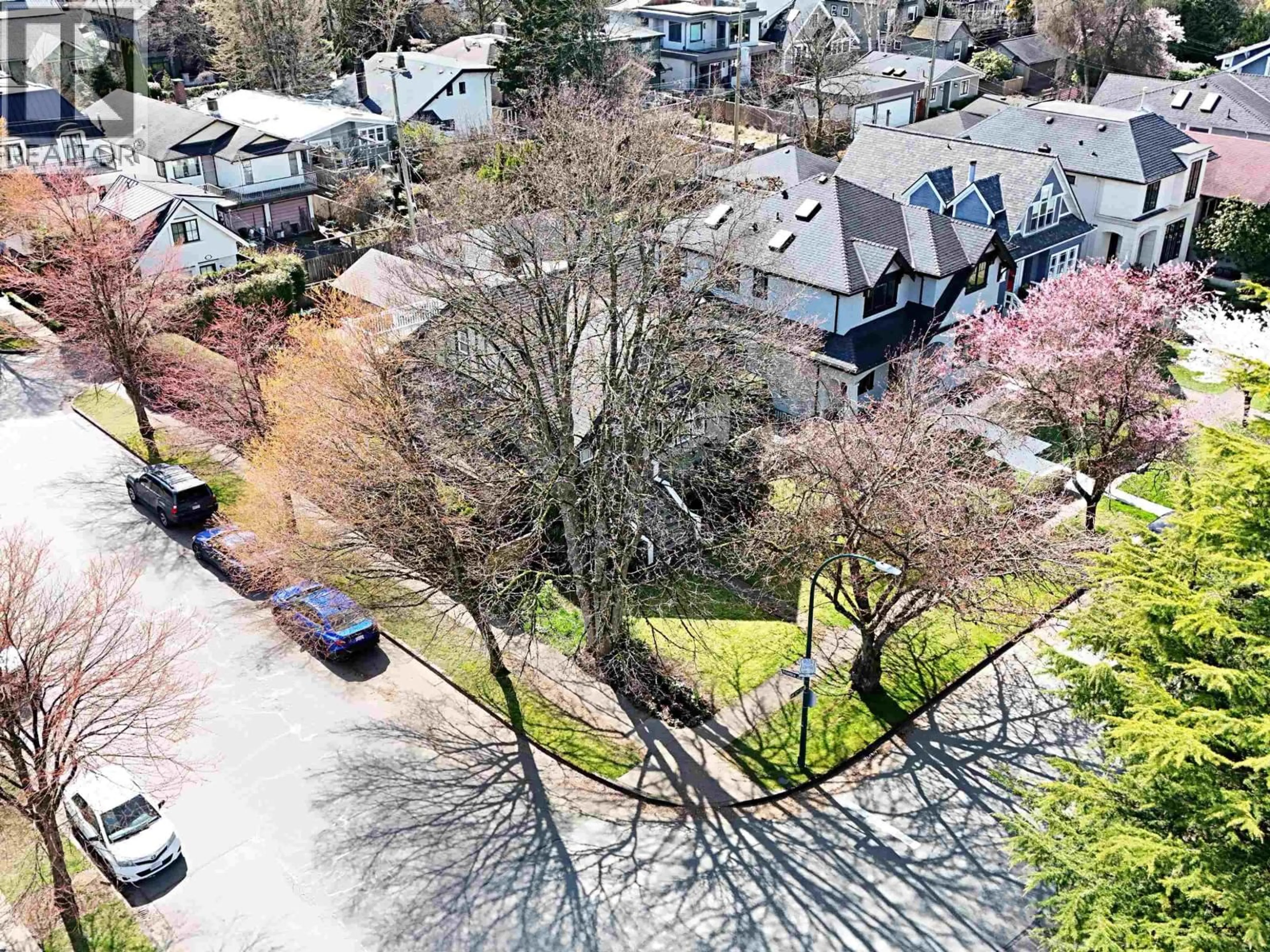 A pic from outside/outdoor area/front of a property/back of a property/a pic from drone, street for 4402 12TH AVENUE, Vancouver British Columbia V6R2R2